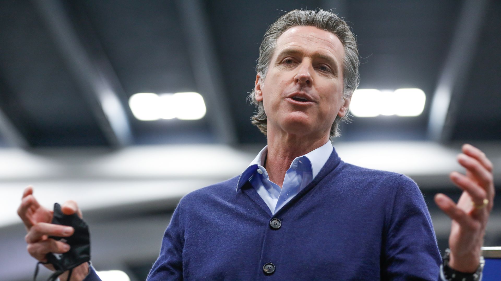 Governor Gavin Newsom speaks to the press at the Moscone Center vaccination site on Friday, Feb. 12, 2021 in San Francisco, California.