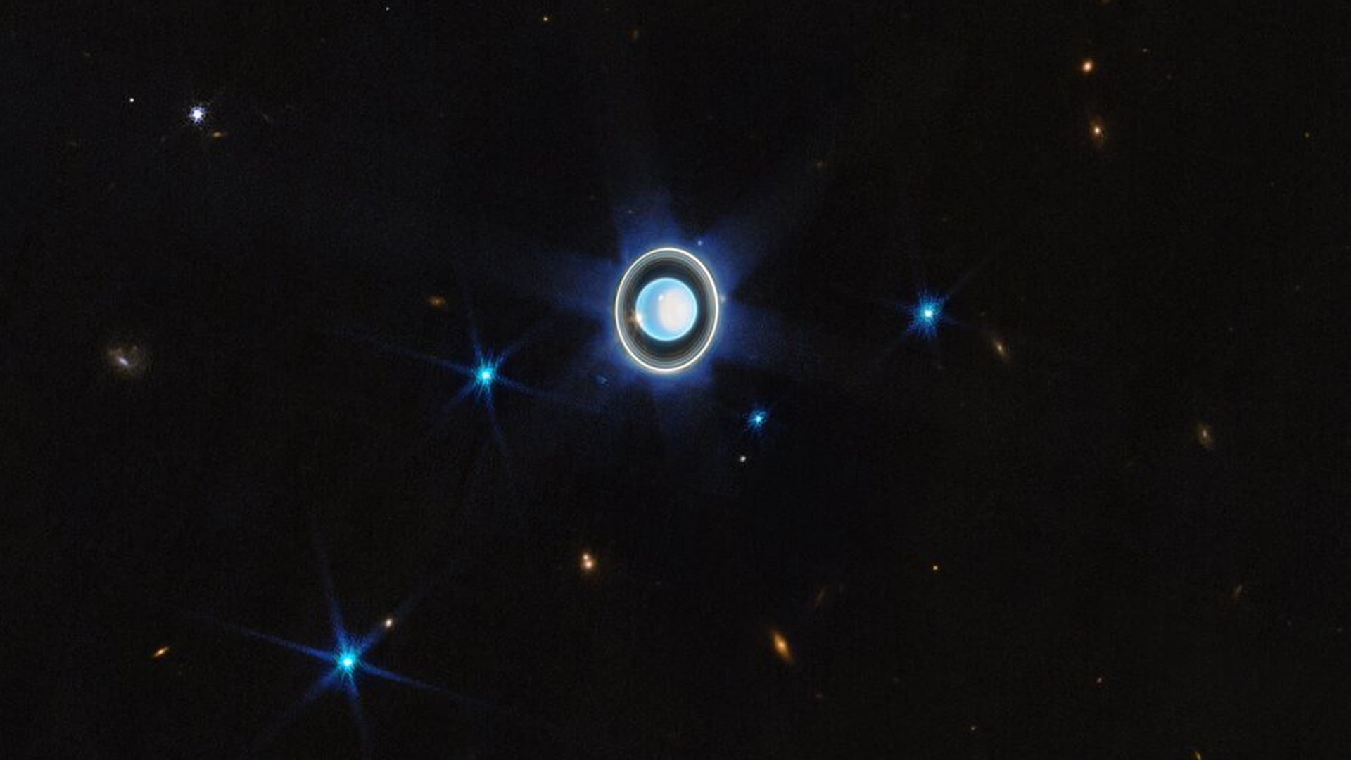 Uranus and its shining rings as seen by the James Webb Space Telescope