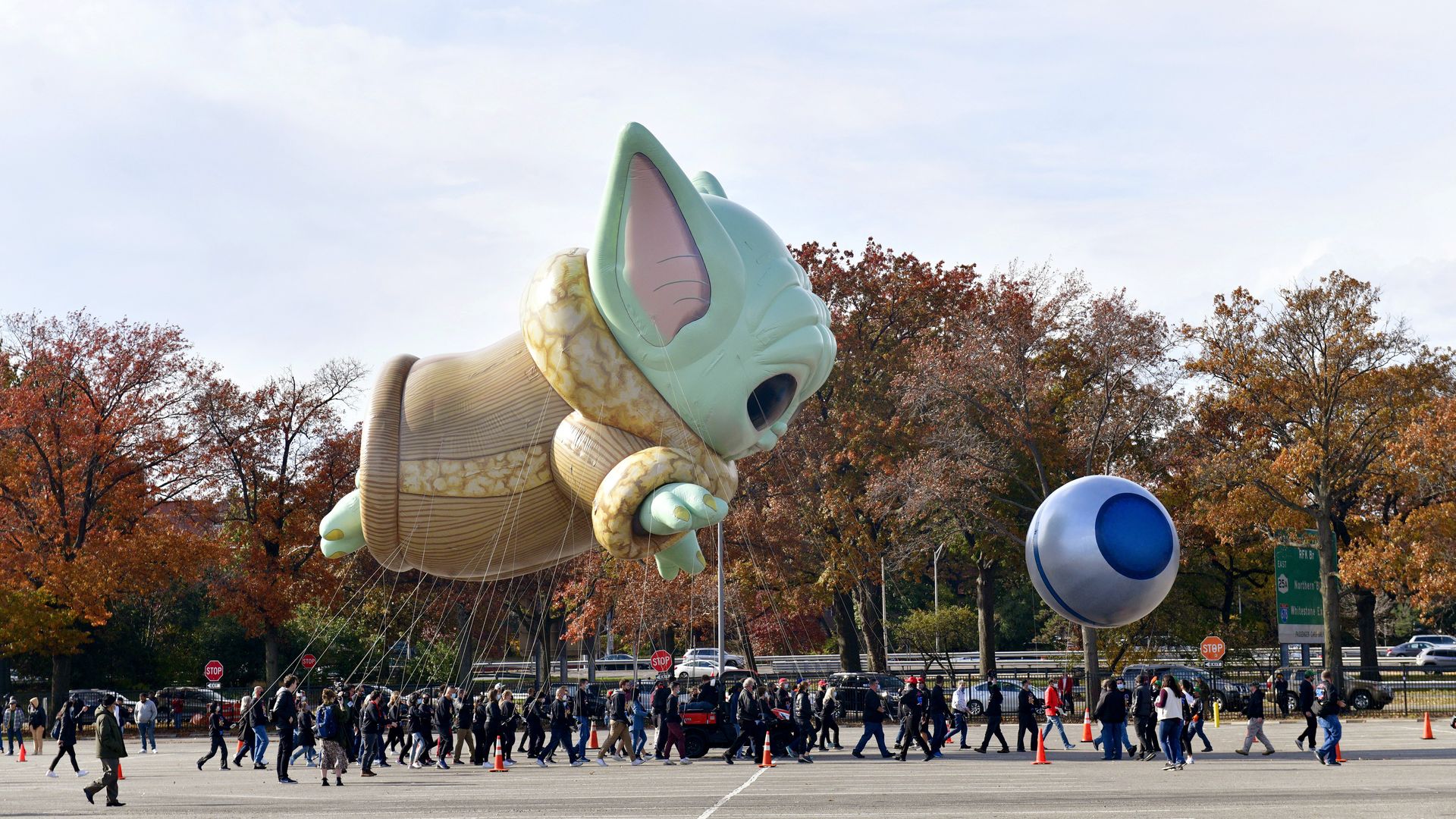 A giant inflated balloon for the Macy's Thanksgiving Day Parade in the shape of Grogu (a.k.a. Baby Yoda in pop culture).