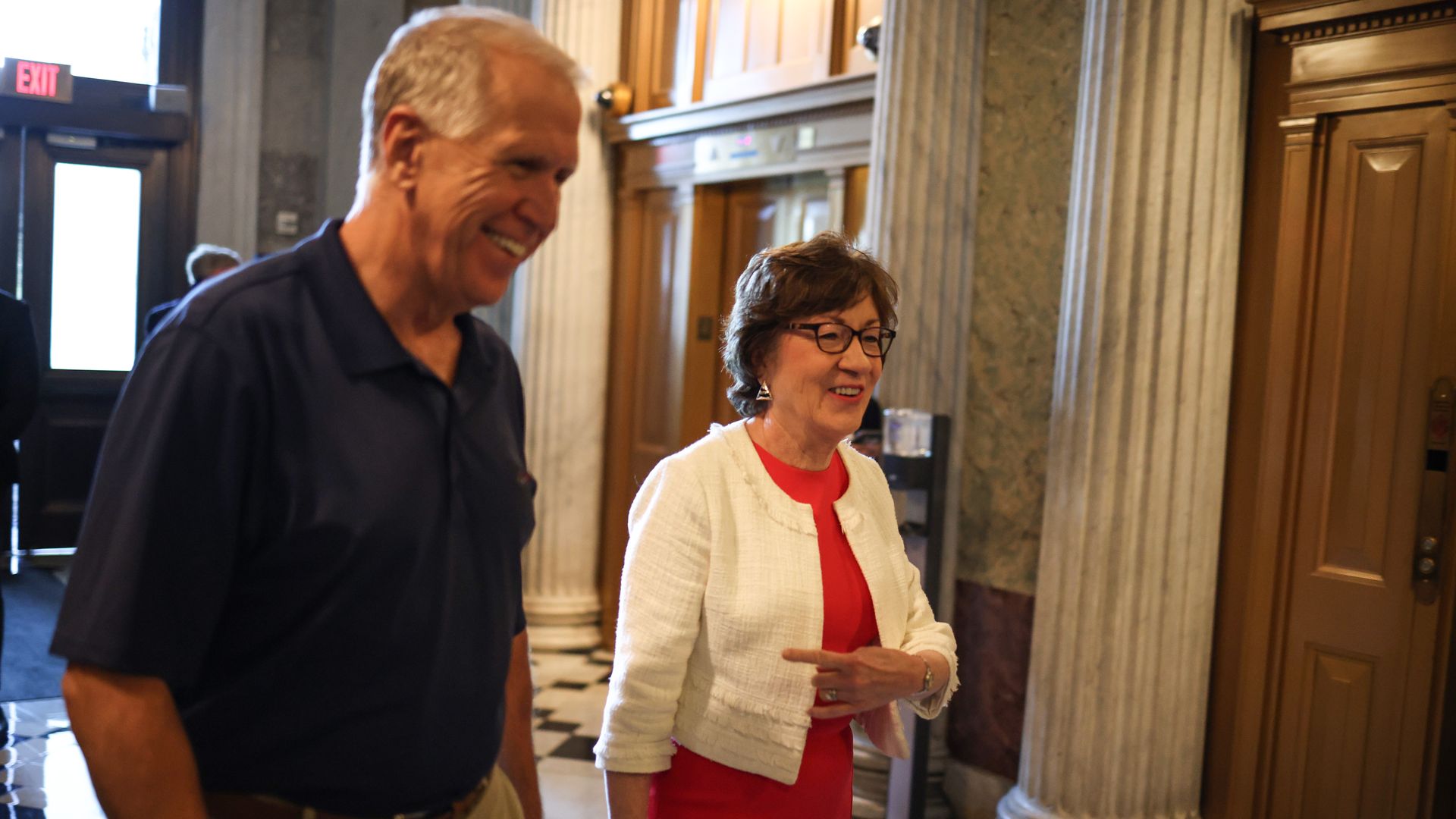 Senators Thom Tillis (R-NC) (L) and Susan Collins (R-ME) (R) walk to the Senate Chambers on July 19, 2021 in Washington, DC. Senate Majority Leader Chuck Schumer (D-NY) is planning for a vote in the Senate on the $1.2 trillion bipartisan infrastructure package.