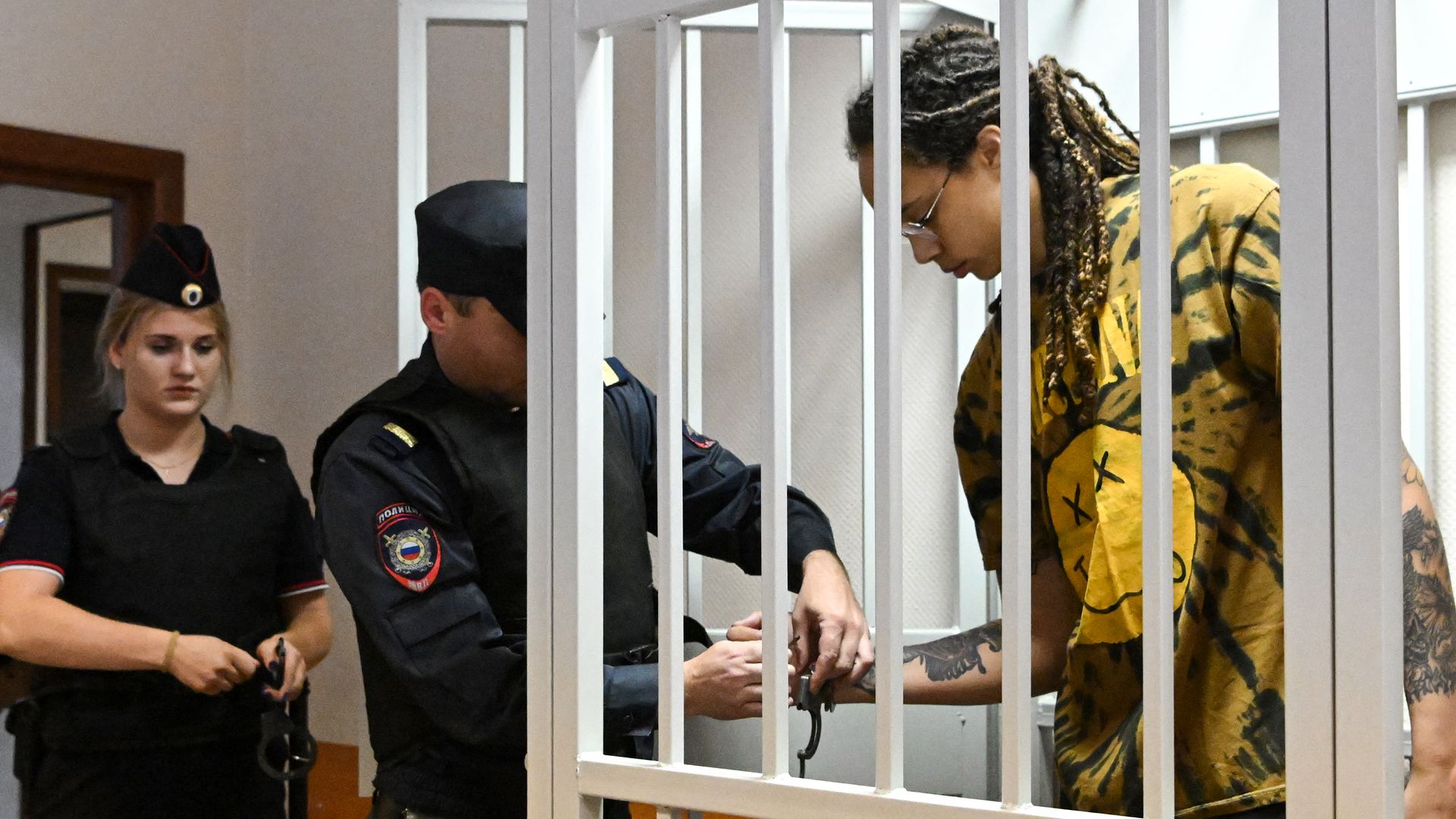US WNBA basketball superstar Brittney Griner gets handcuffs taken off before a hearing at the Khimki Court in the town of Khimki outside Moscow on July 15, 2022.