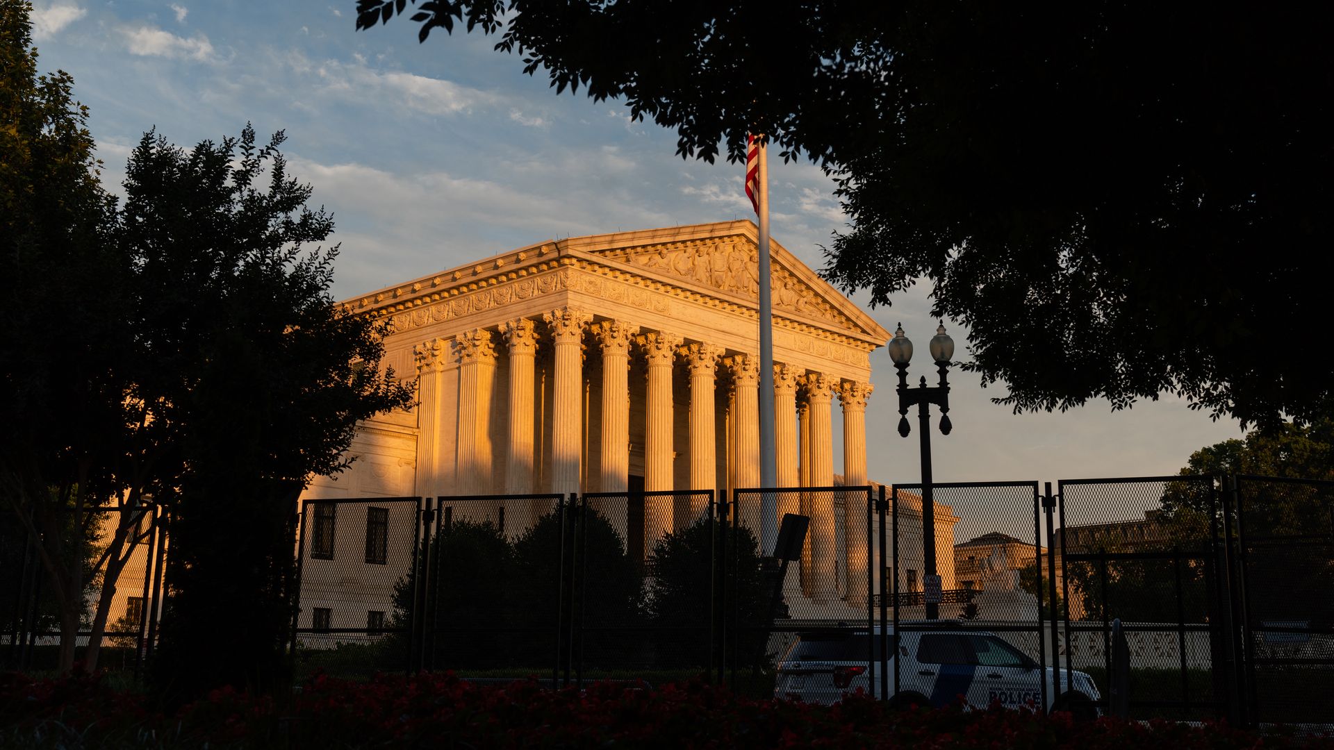 Photo of the Supreme Court facade as the sun sets