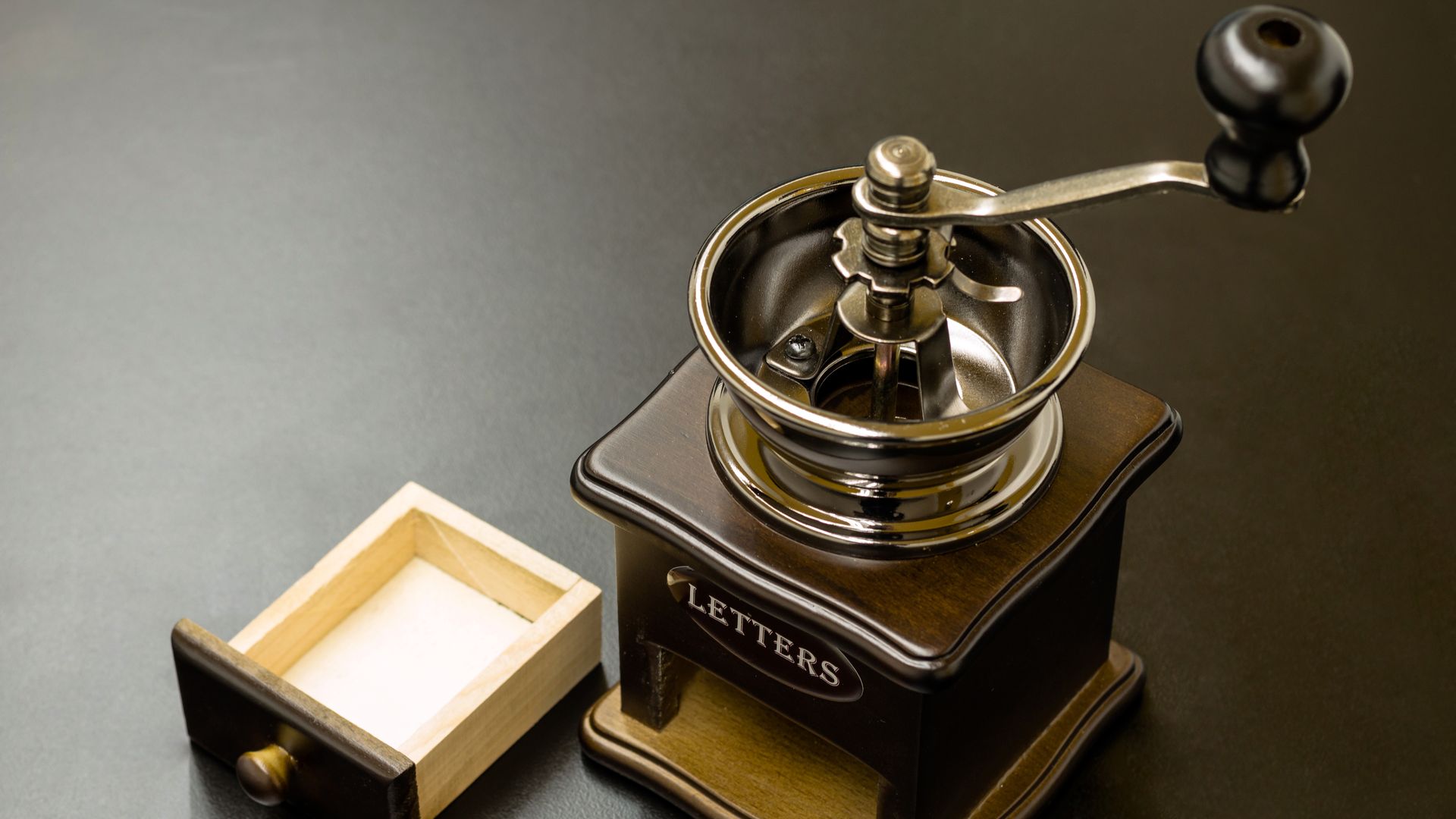 Photo of a manual hand-cranked grinder