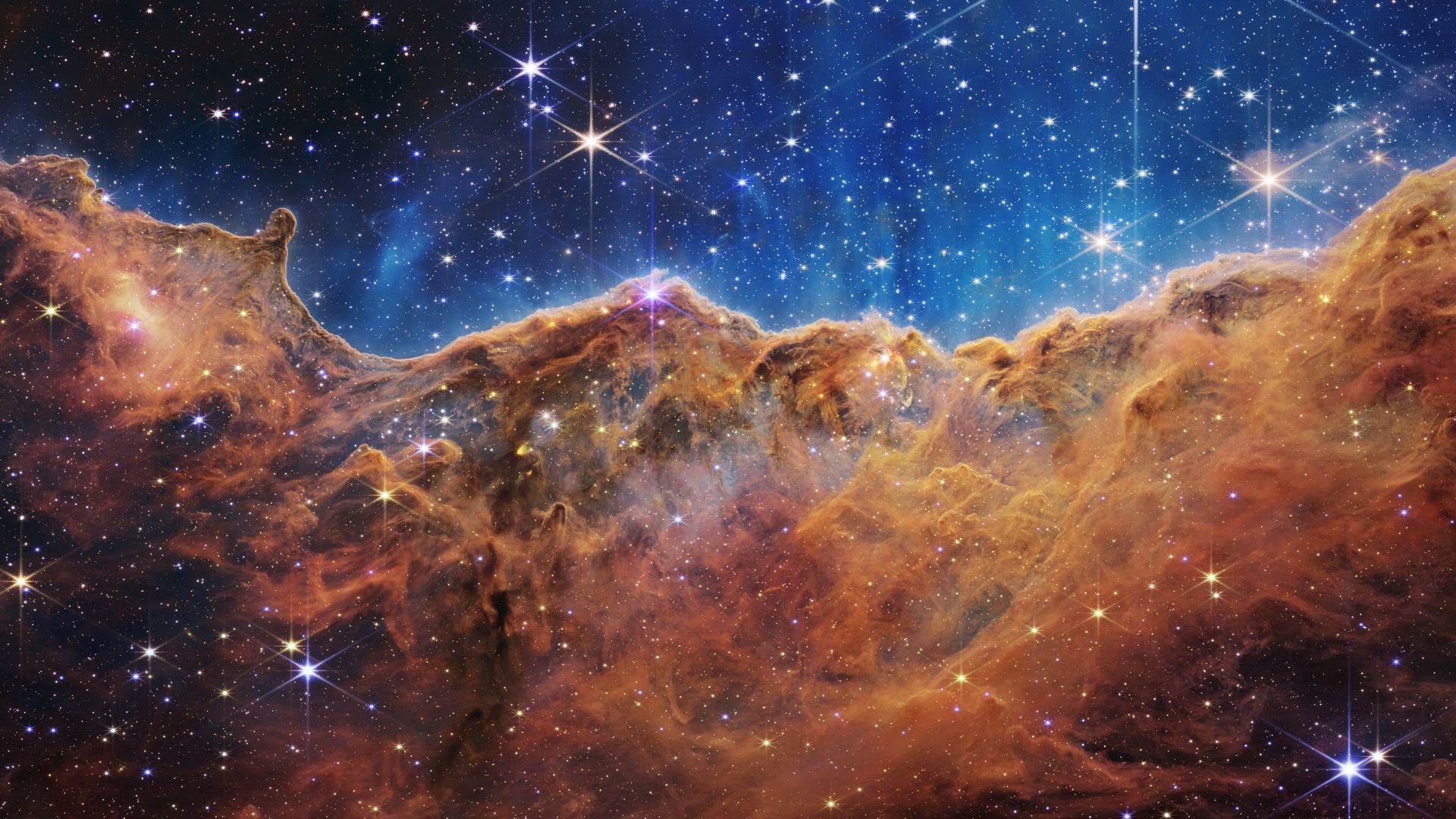 The edge of a young, star-forming region called NGC 3324 as seen by the James Webb Space Telescope.