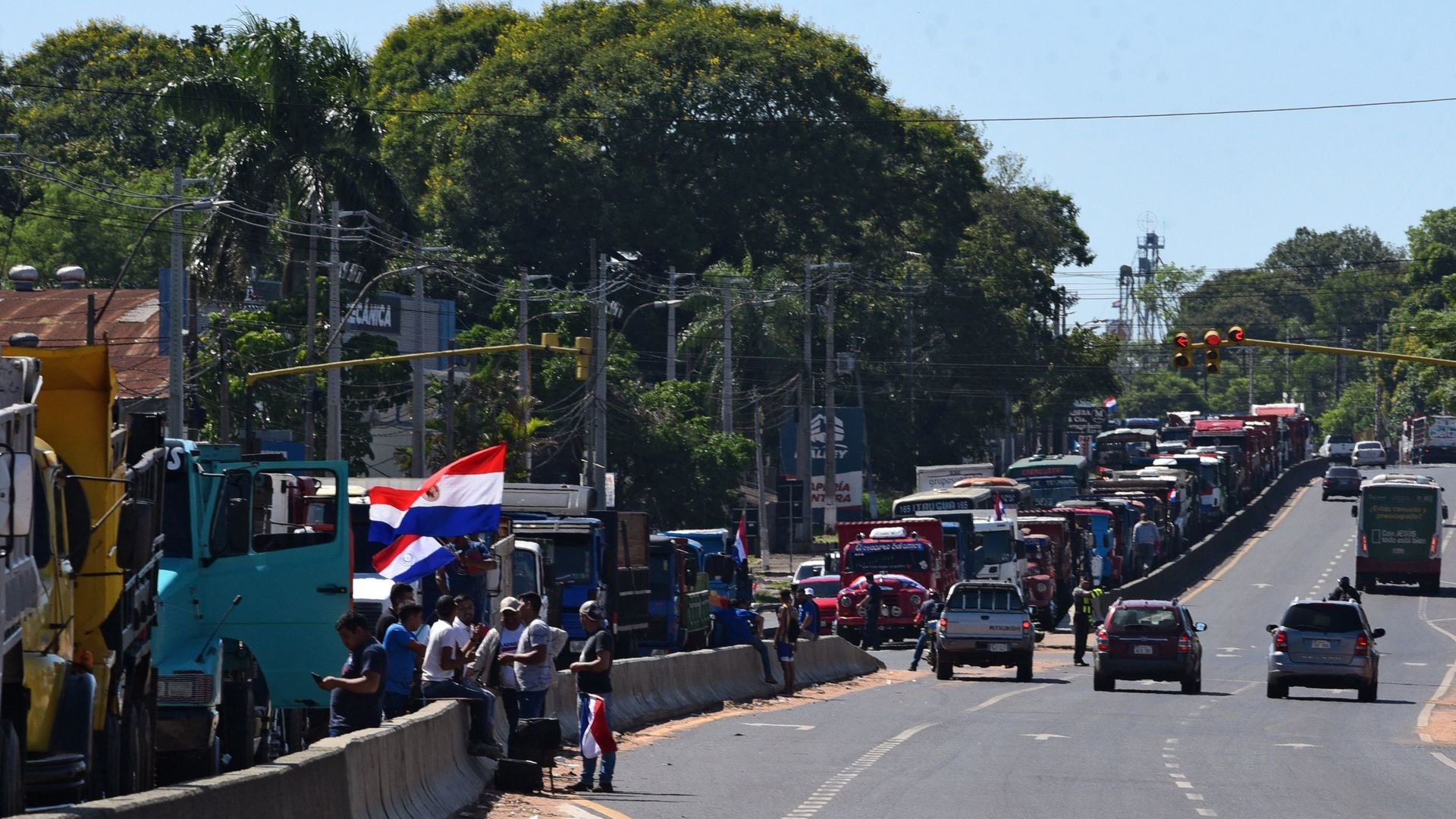 A convoy of truckers on a road to Paraguay's capital, where they are protesting high gas prices
