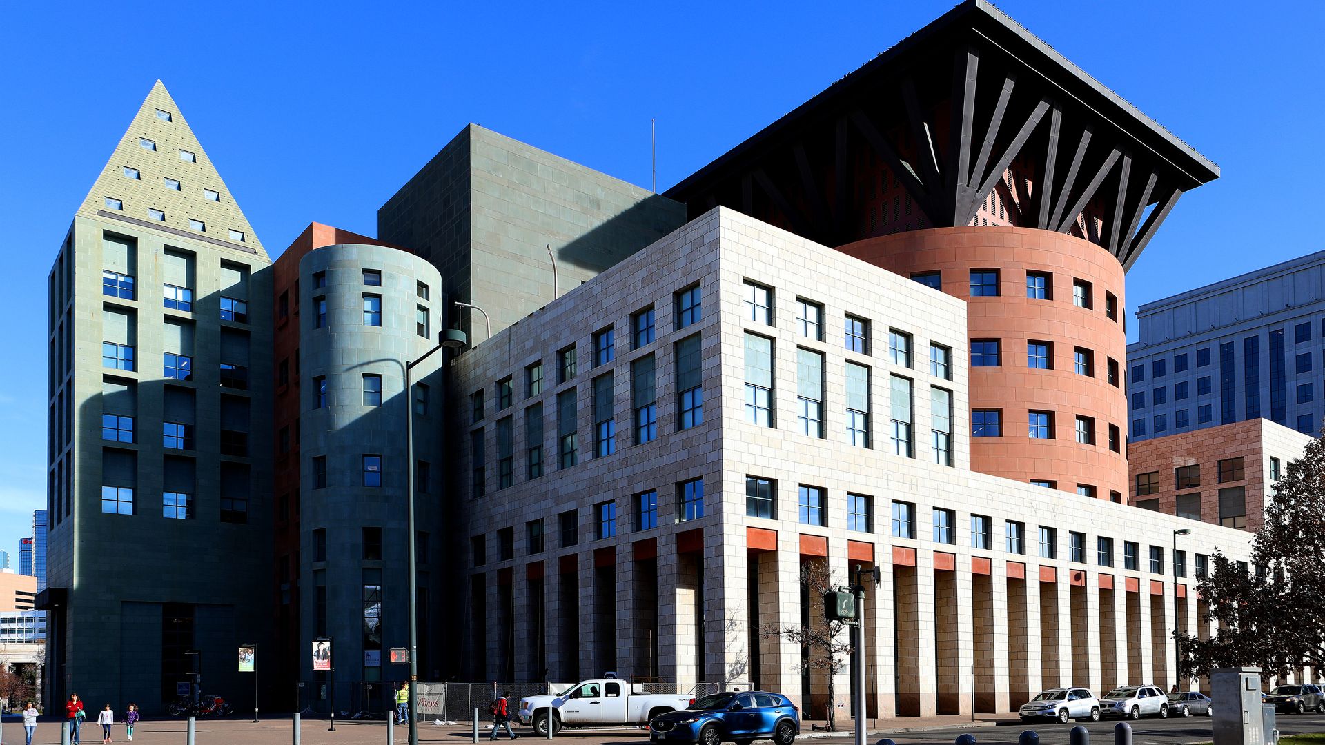 A large building with several block-like structures. 