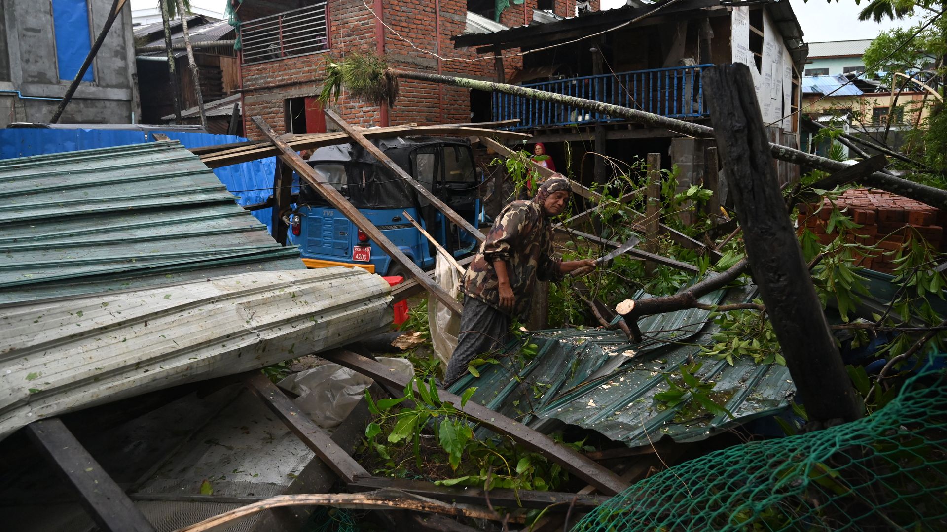 Local residents check the damage after Cyclone Mocha hit Kyauktaw in Myanmar's Rakhine state. Photo: Sai Aung Main/AFP via Getty Images