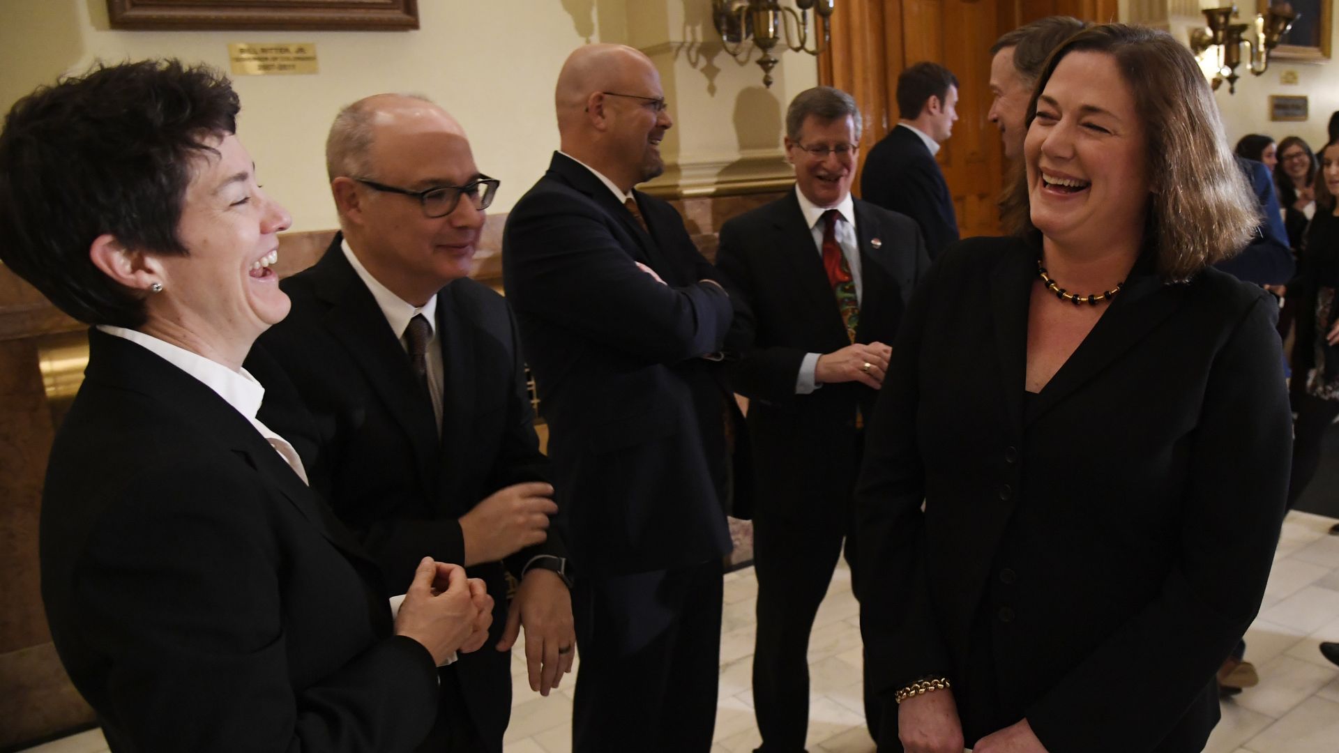 Colorado Supreme Court Justice Monica Márquez, left, talks with other justices, including Meliss Hart, right, in 2017. Photo: Andy Cross/The Denver Post via Getty Images