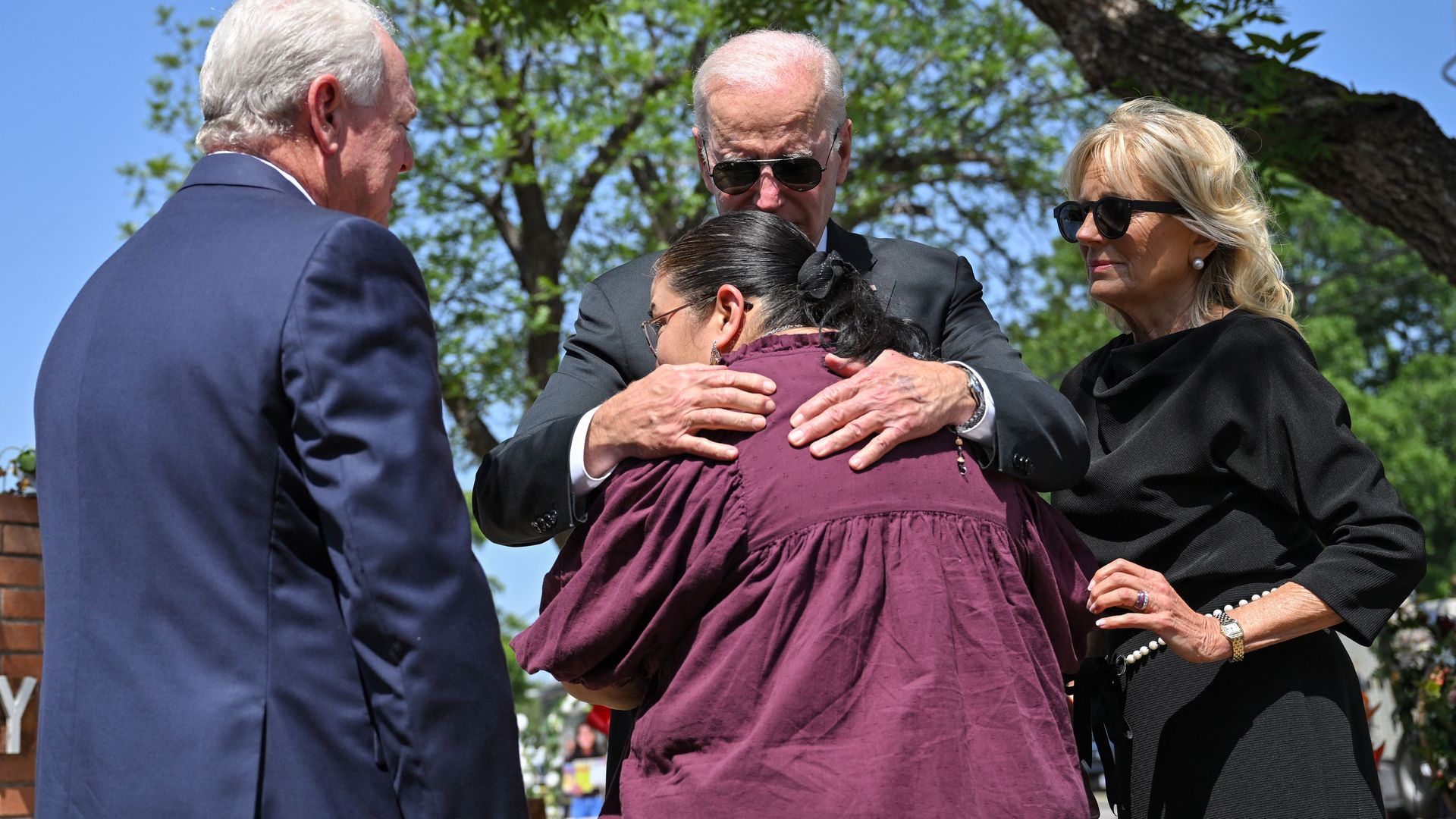 President Joe Biden embraces Mandy Gutierrez, the Priciple of Robb Elementary School, as he and First Lady Jill Biden pay their in Uvalde, Texas on May 29.