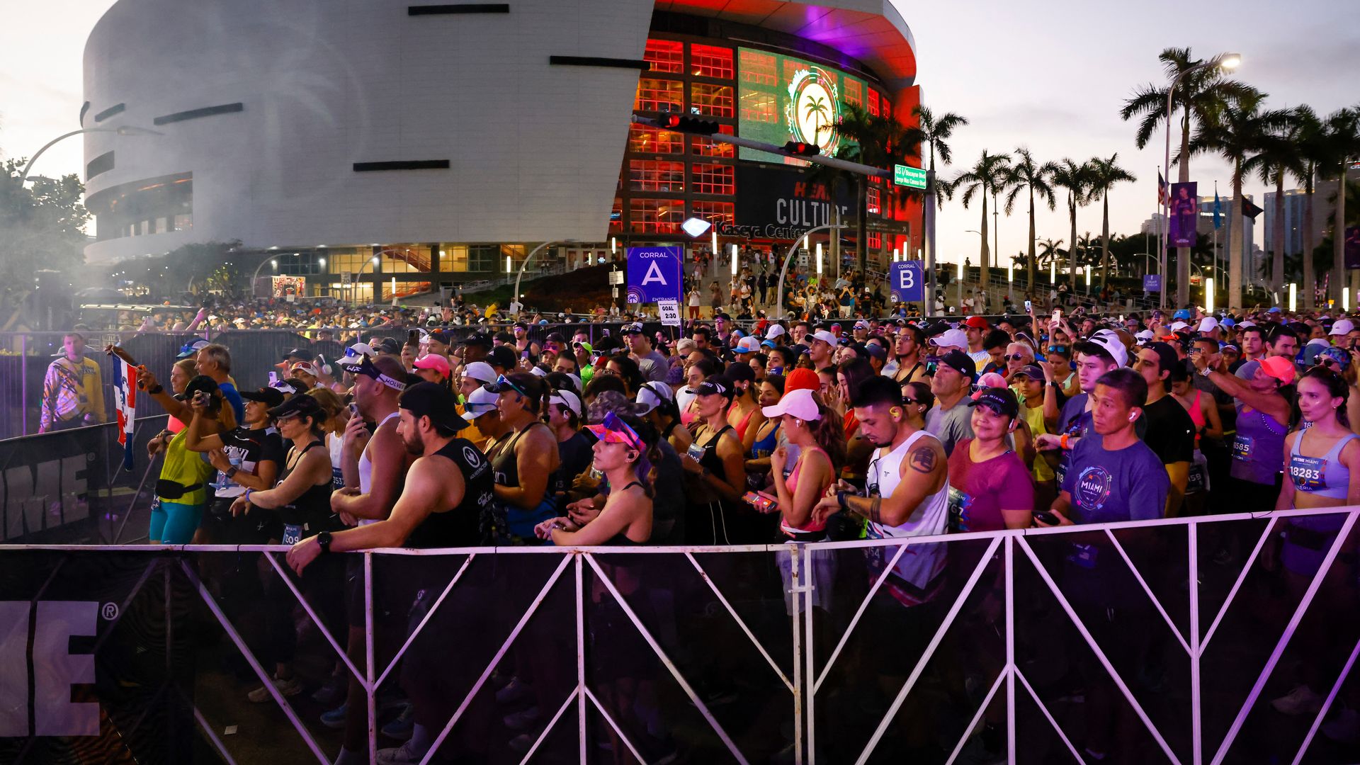 A group of runners at the starting line of a race.