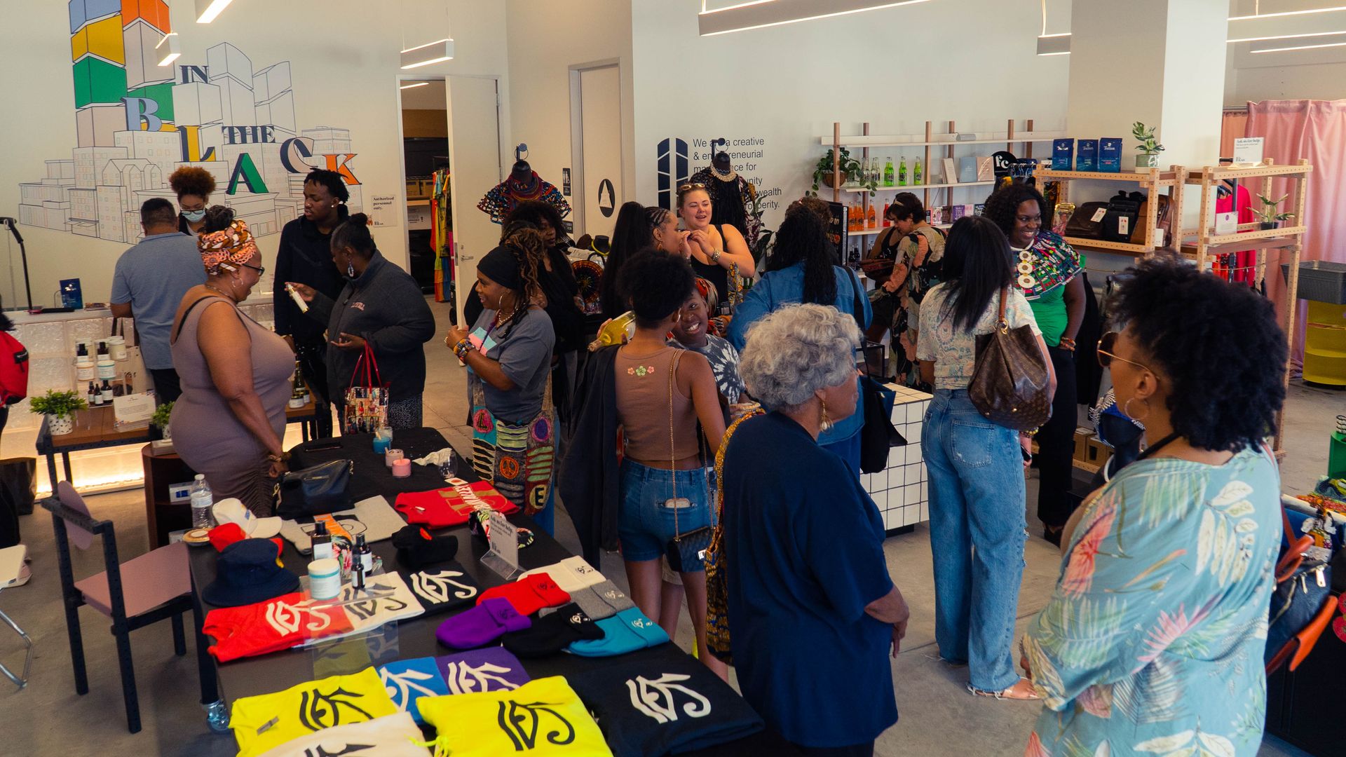 Photo of people mingling in an indoor marketplace