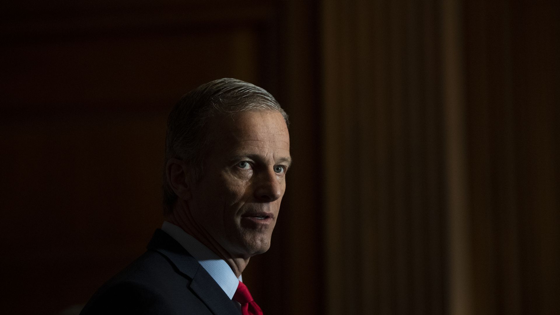 Photo of John Thune looking off into the distance