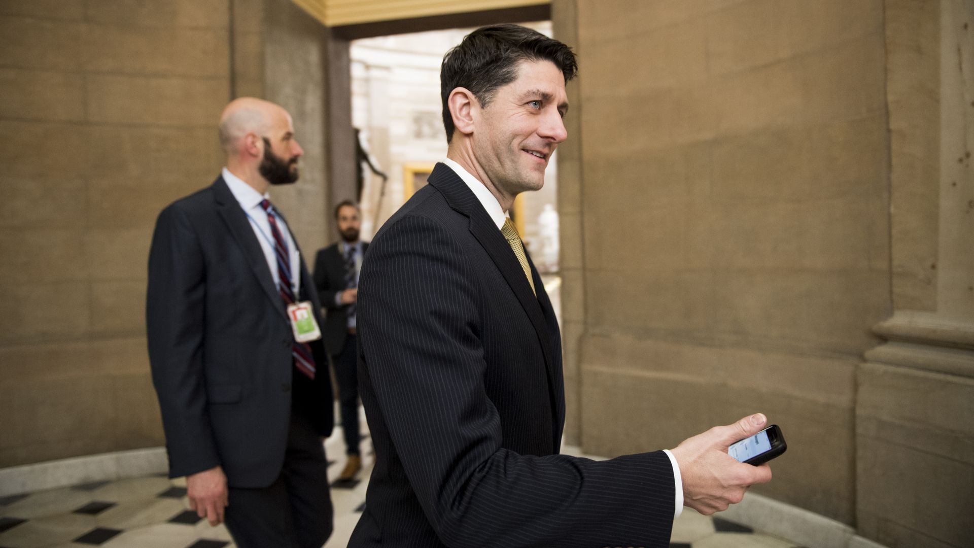 House Speaker Paul Ryan walks through the Capitol