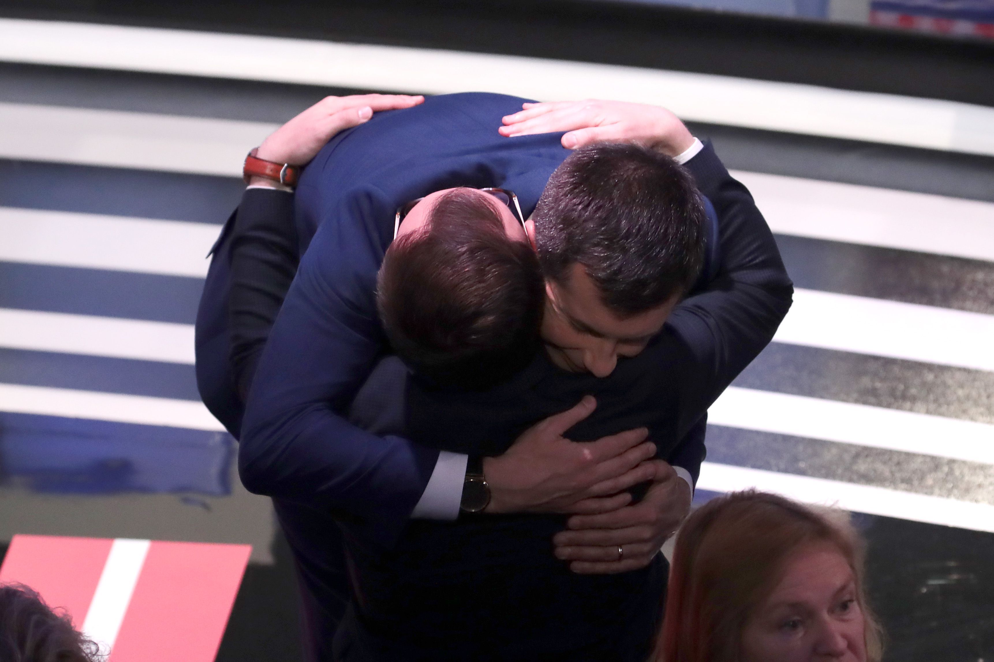 Pete Buttigieg hugs his husband Chasten Buttigieg after the Democratic presidential primary debate 