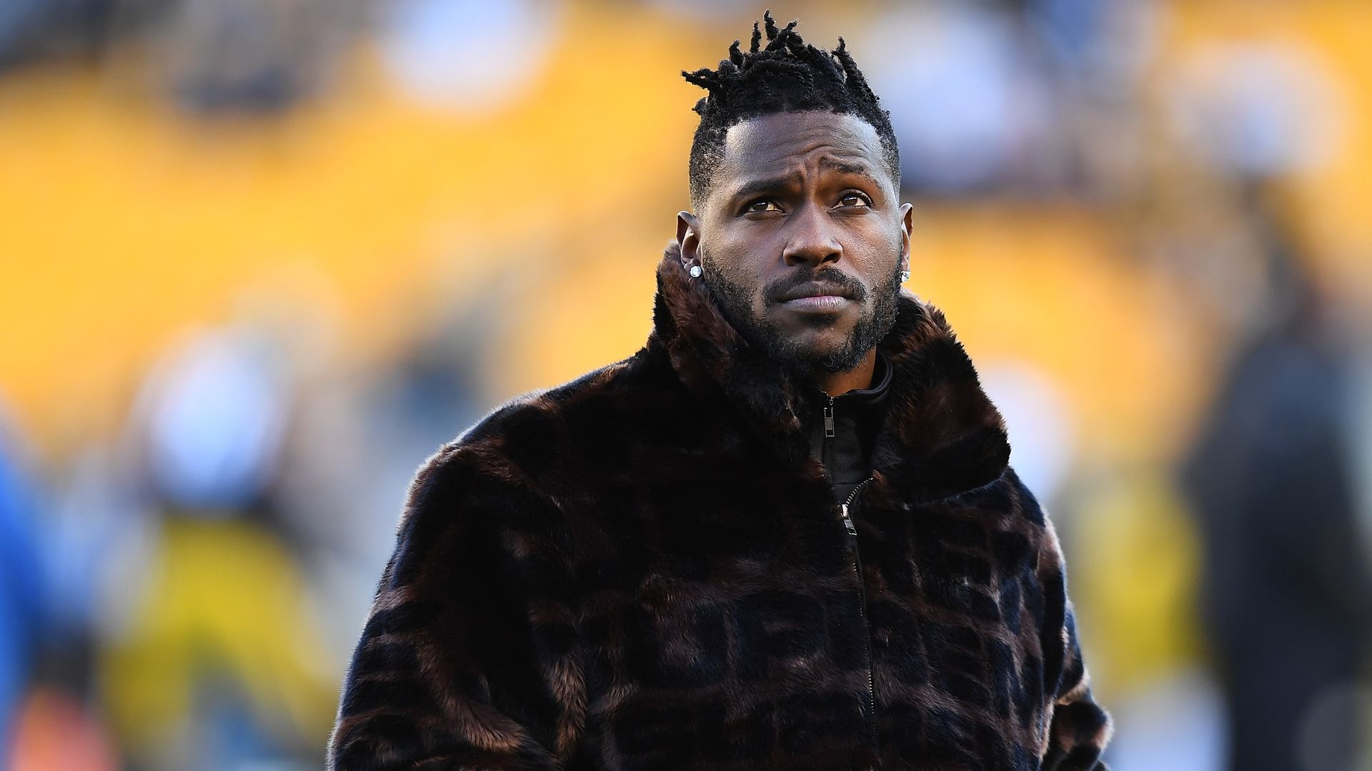 Antonio Brown wearing a wool coat