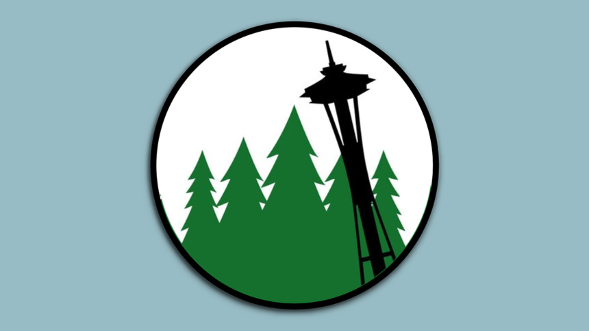 A circular logo featuring silhouettes of the Space Needle and evergreen trees