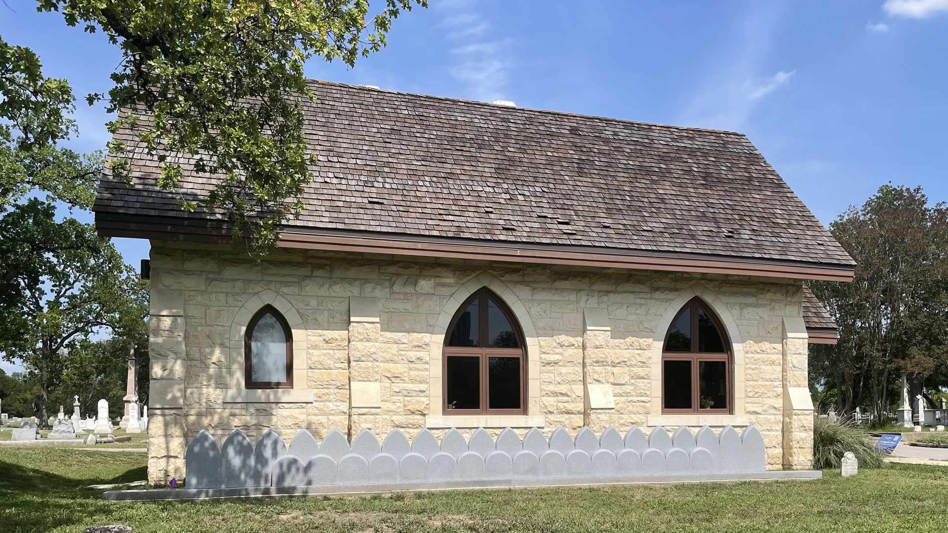 A newly installed granite monument memorializes 36 people reinterred by Oakwood Cemetery Chapel.