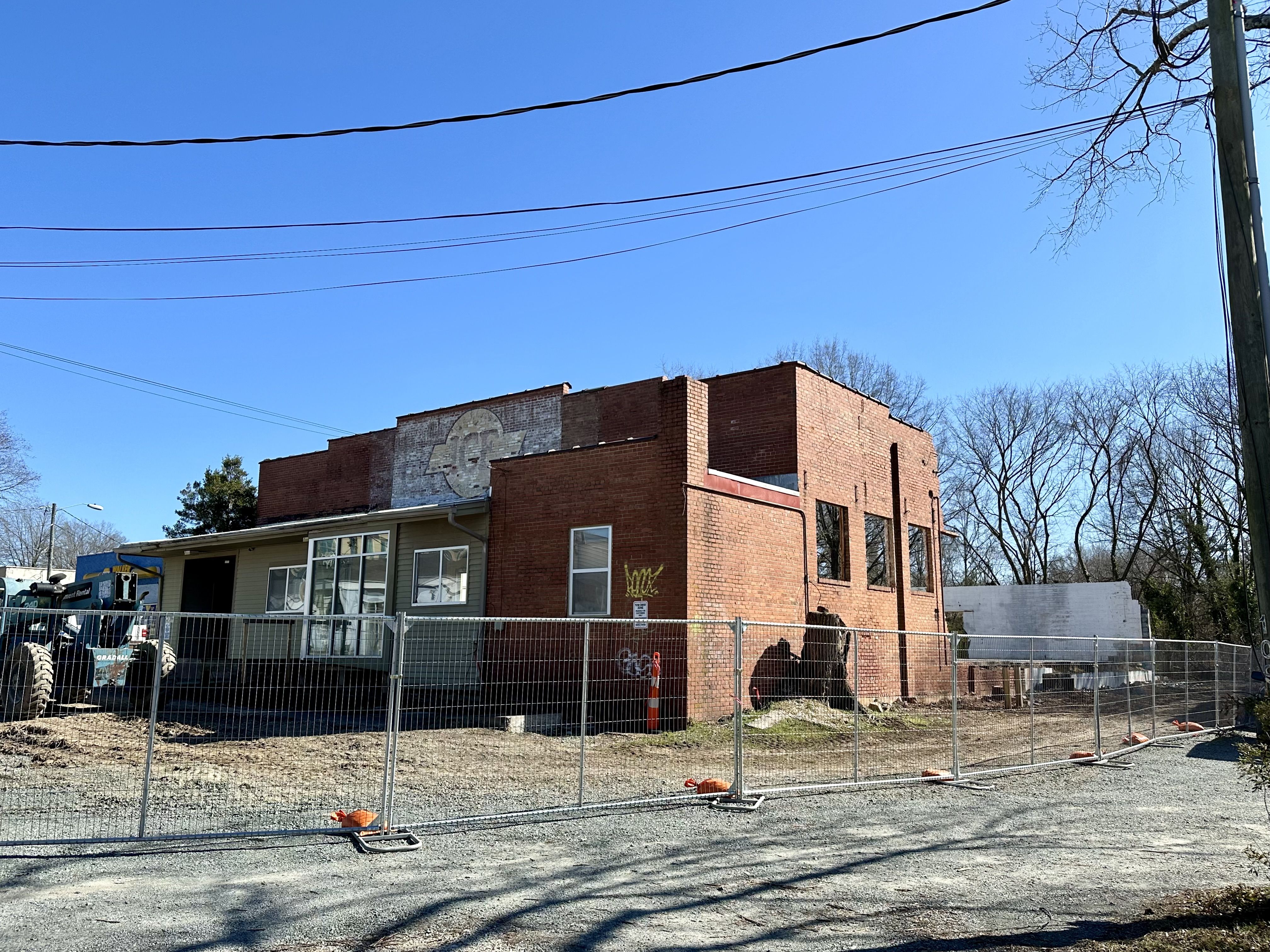 A photo of a brick building being renovated at 107 Brewer Lane in Carrboro