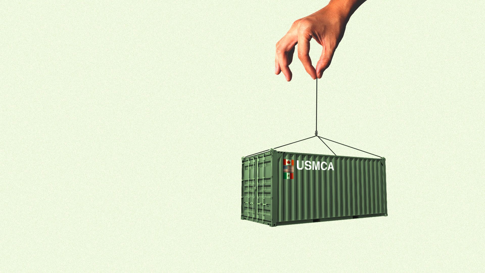 A hand holding a shipping container labeled USMCA by a fine string