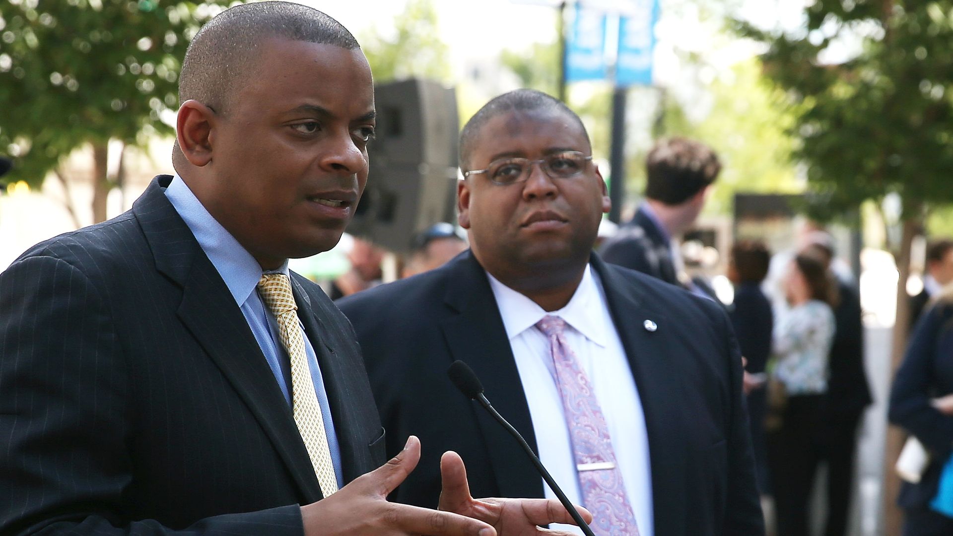 image of former transportation safety regulators Anthony Foxx and David Strickland