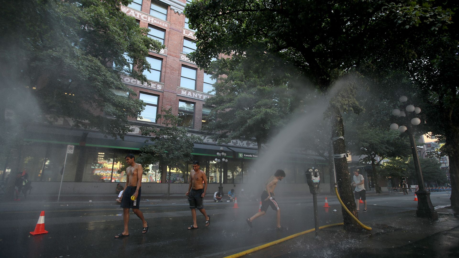 A temporary misting station on Abbott Street during a heatwave in Vancouver, British Columbia, Canada, on Monday, June 28