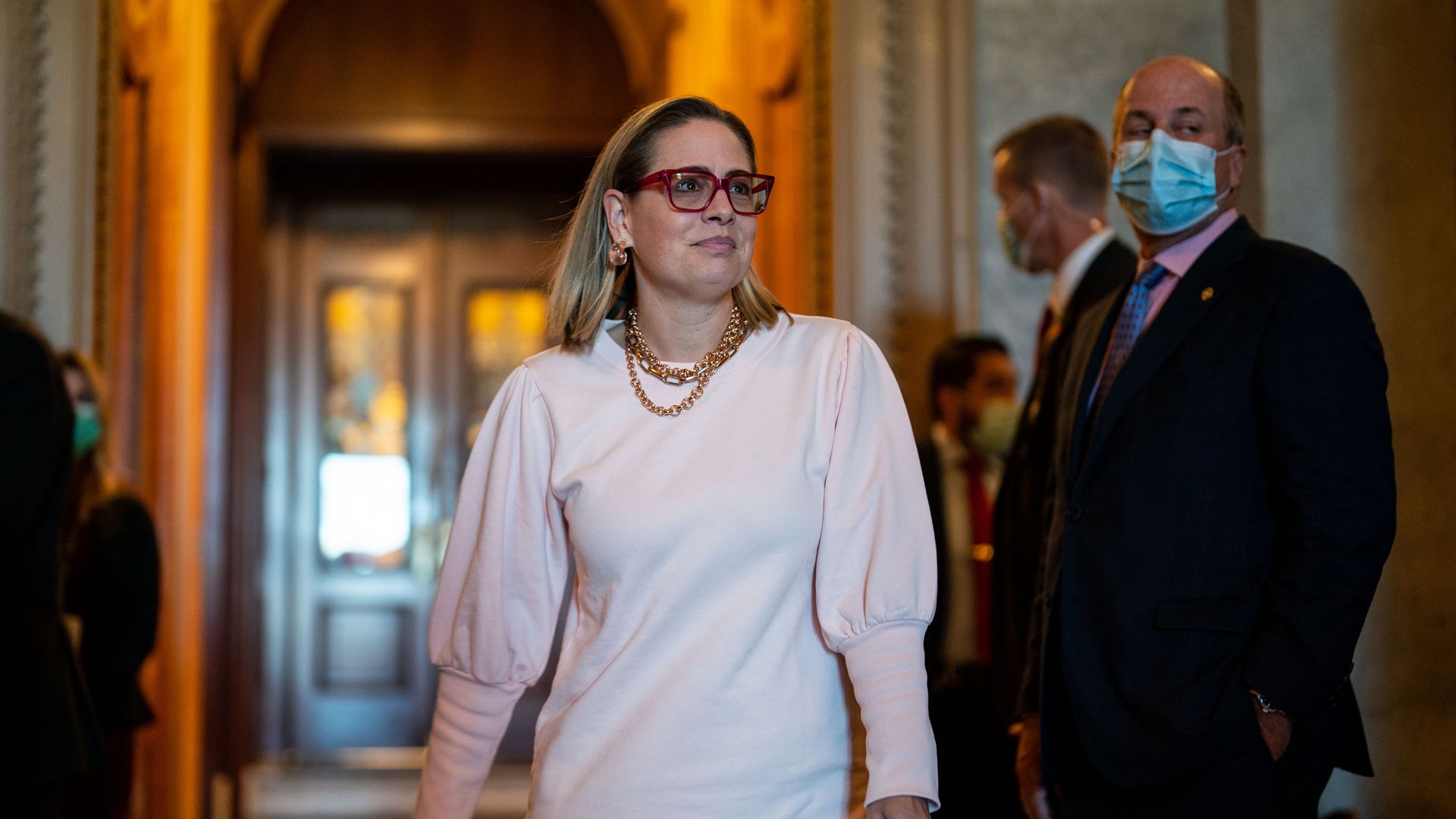 Sen. Kyrsten Sinema is seen outside the U.S. Senate.