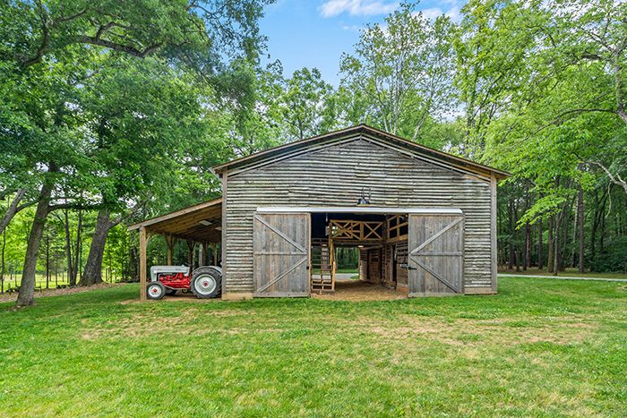 7210 Sample Road main house barn