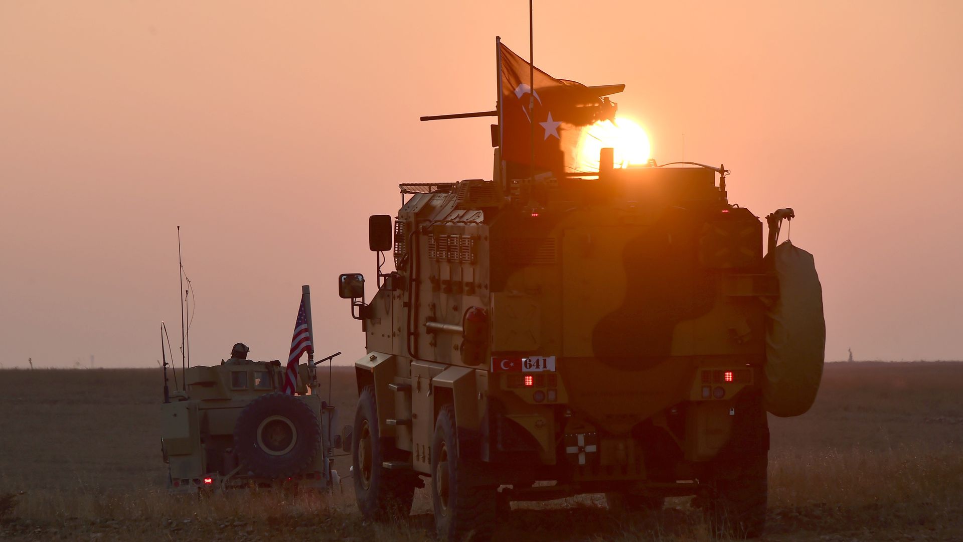 Armored vehicles carrying Turkish and U.S. troops conduct their second round of joint patrols in the northern Syrian city of Manbij, as part of a deal to rid the area of the YPG/PKK 