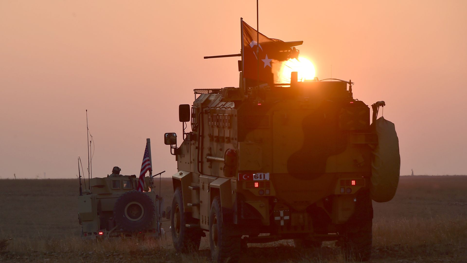 Armored vehicles carrying Turkish and U.S. troops conduct their second round of joint patrols in the northern Syrian city of Manbij, as part of a deal to rid the area of the YPG/PKK