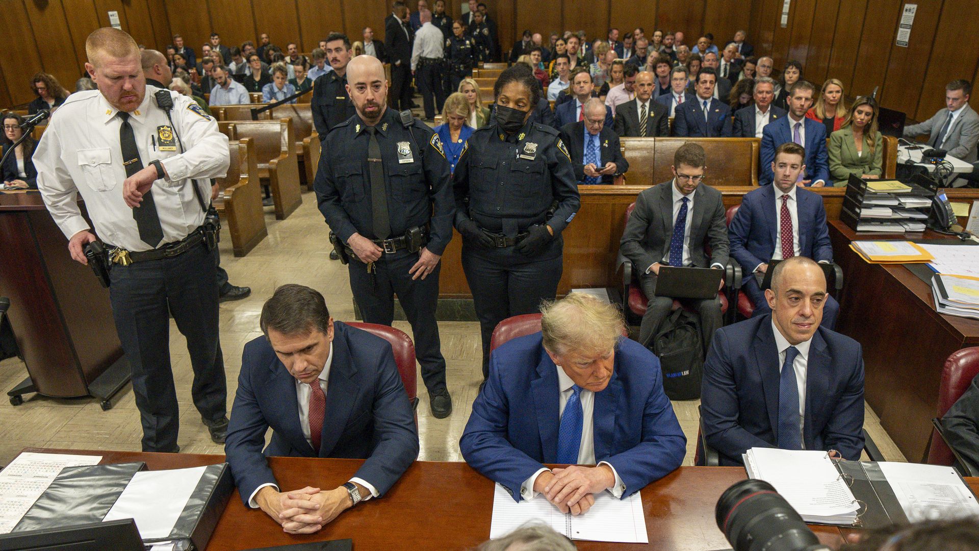 Former U.S. President Donald Trump appears in court with attorneys Todd Blanche (L) and Emil Bove (R) during his trial for allegedly covering up hush money payments at Manhattan Criminal Court on May 20, 2024 in New York City.