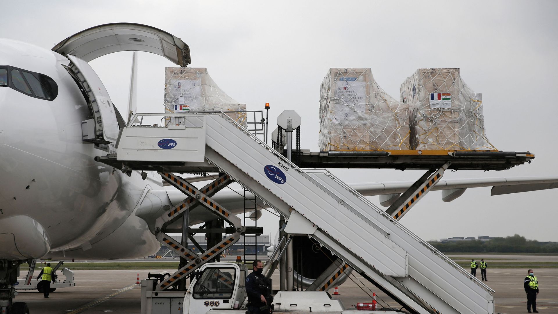 Medical supplies being loaded into a cargo plane headed to India, at Roissy airport, north of Paris. 