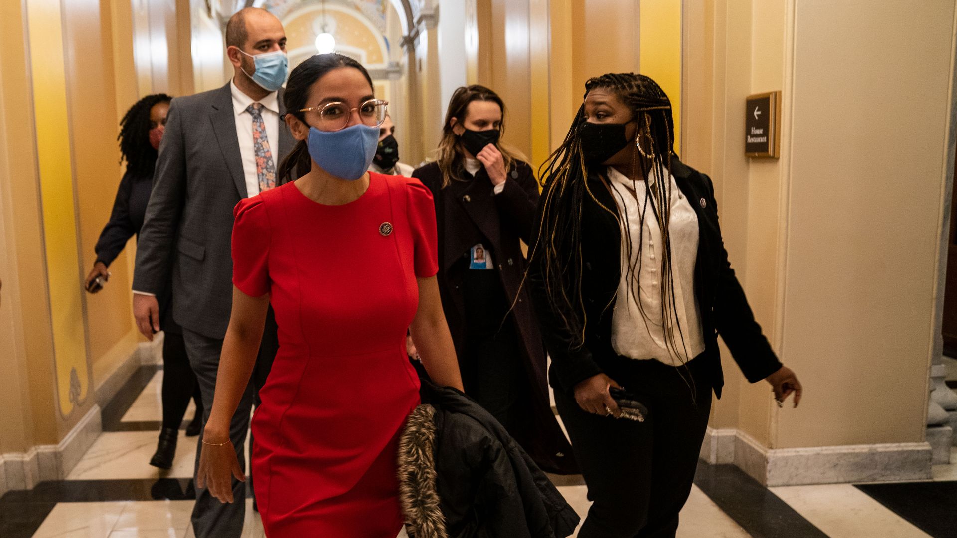 Reps. Alexandria Ocasio-Cortez and Cori Bush are seen walking through the Capitol last month.