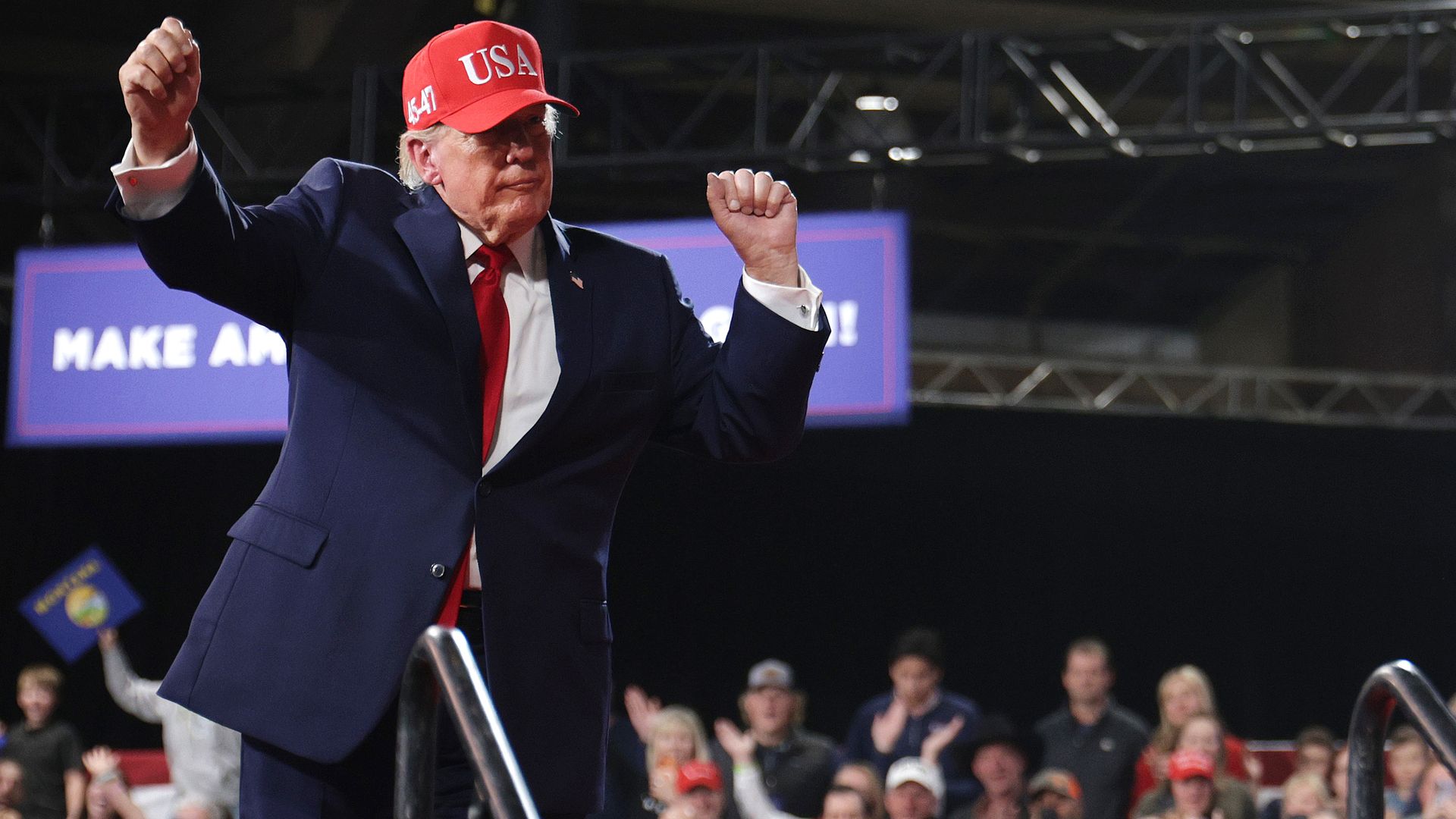 Trump dances in red cap