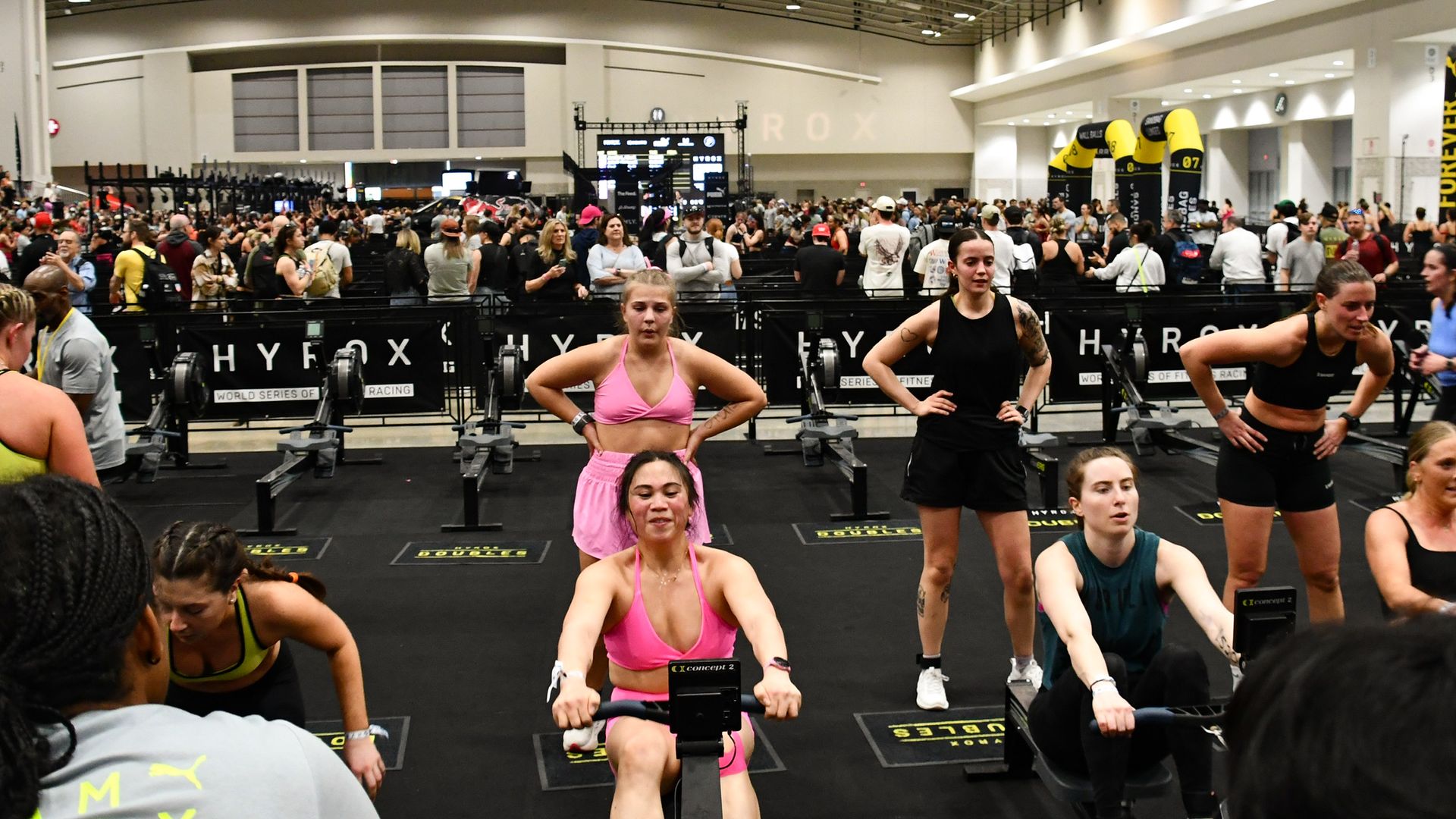 A bunch of people working out and looking fit 