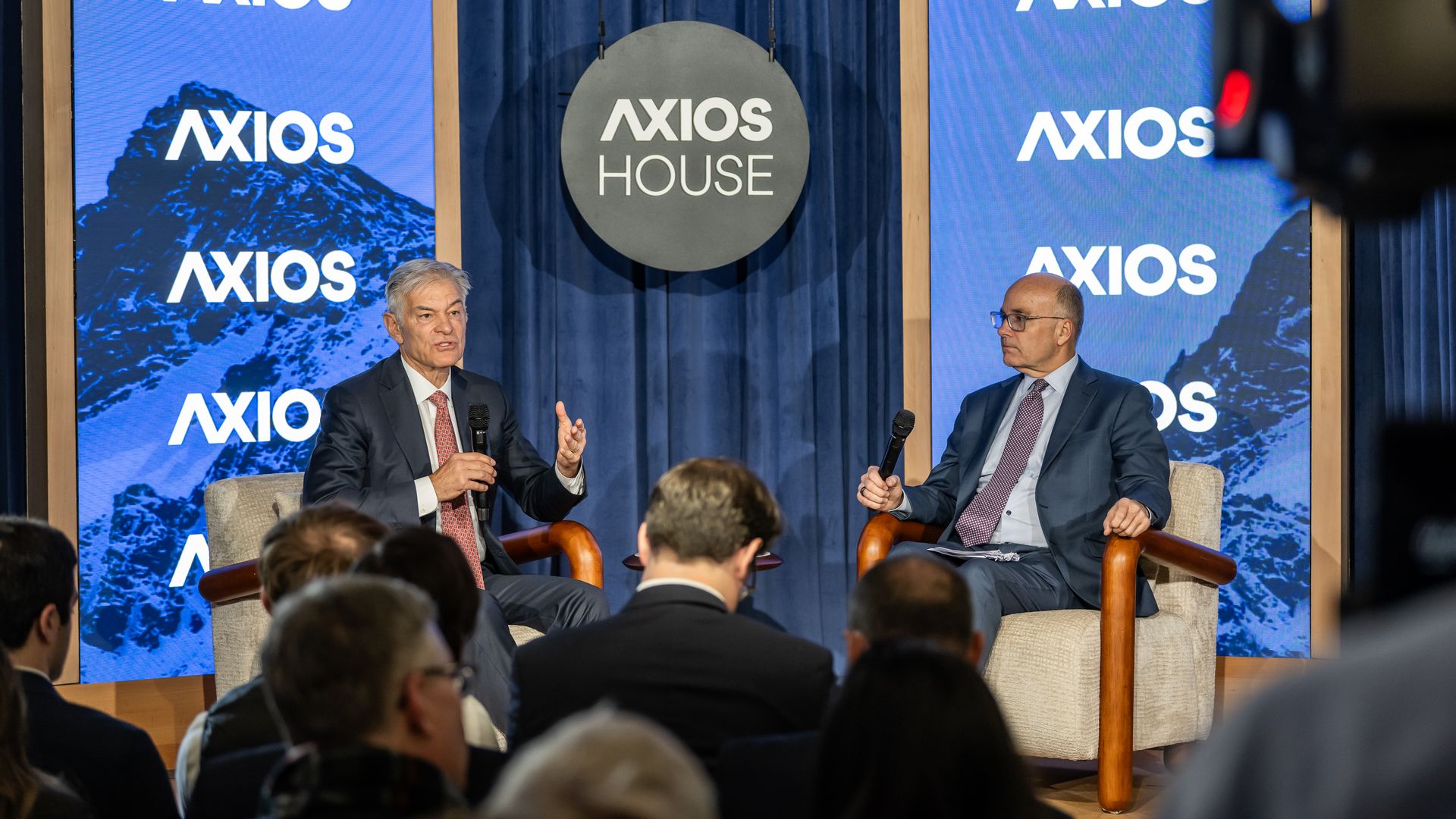 Centers for Medicare and Medicaid Services chief Mehmet Oz talks with Mike Allen at an Axios House event in Davos.