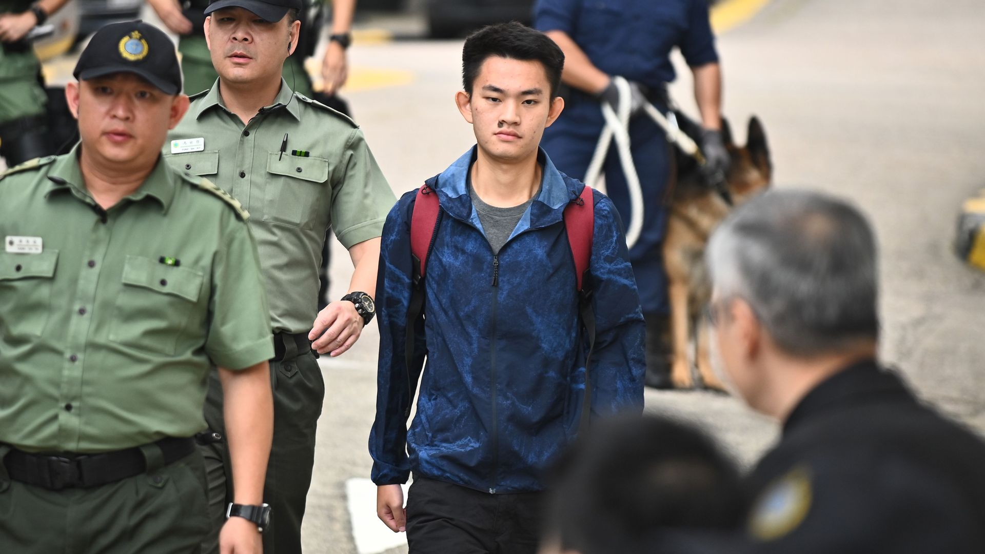 Chan Tong-kai, 20, wanted in Taiwan for the murder of his pregnant girlfriend during a holiday the two Hong Kongers took there in 2018, walks out the Pik Uk Prison in Hong Kong on October 23