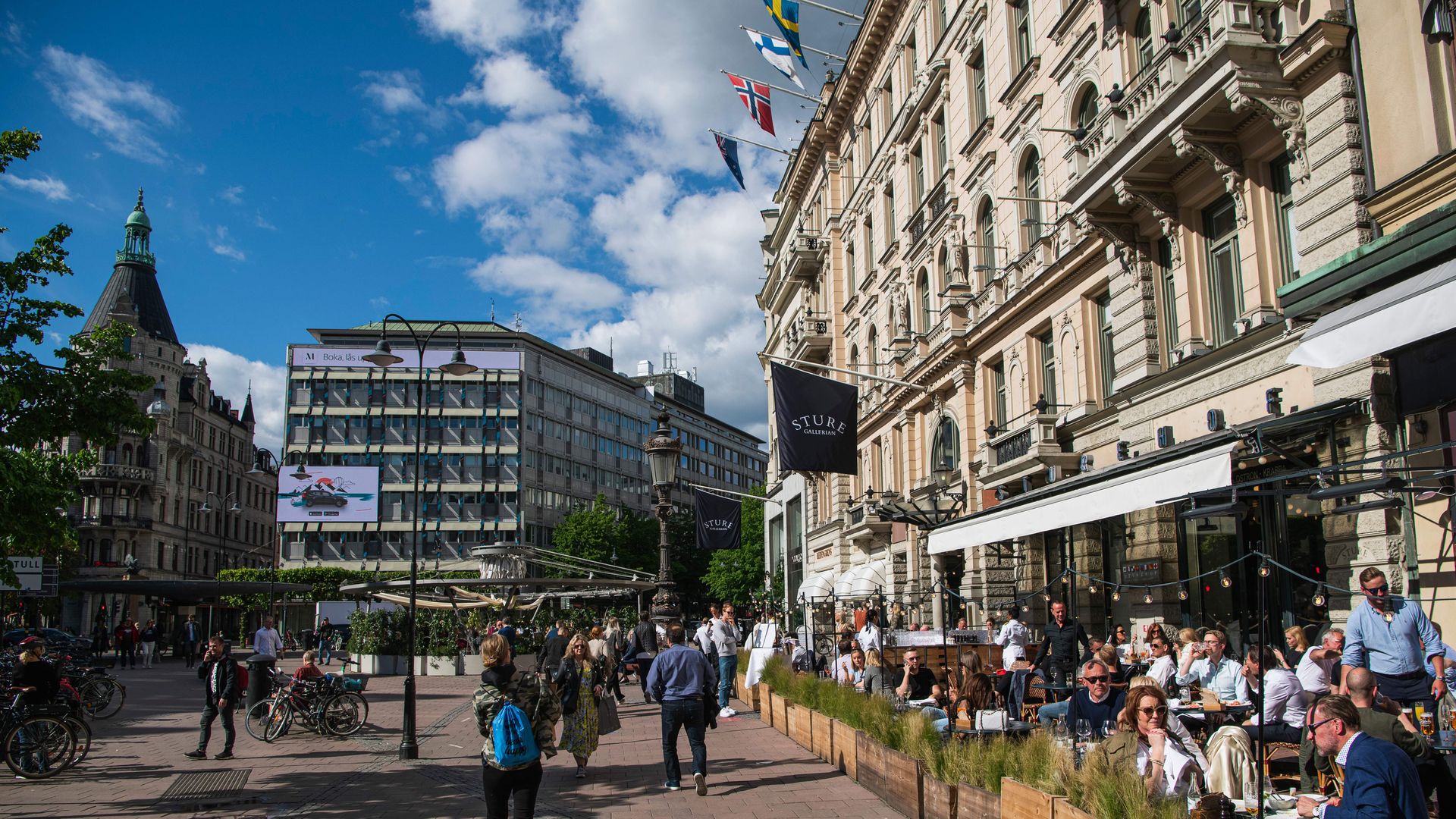 People sit in a restaurant in Stockholm on May 29, 2020, amid the coronavirus COVID-19 pandemic. 
