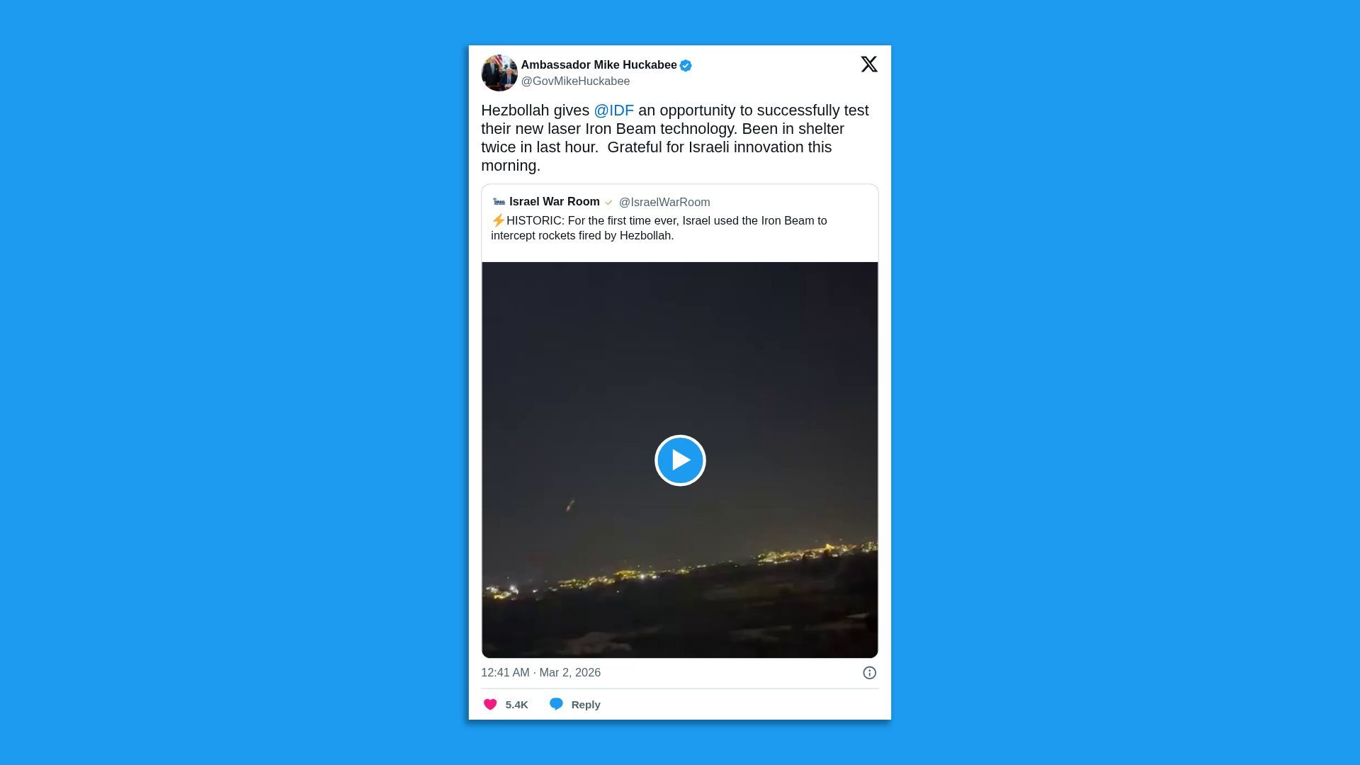 Screenshot of an X post by Ambassador Mike Huckabee commenting on Israel's reported use of the Iron Beam system, with an embedded nighttime video clip.