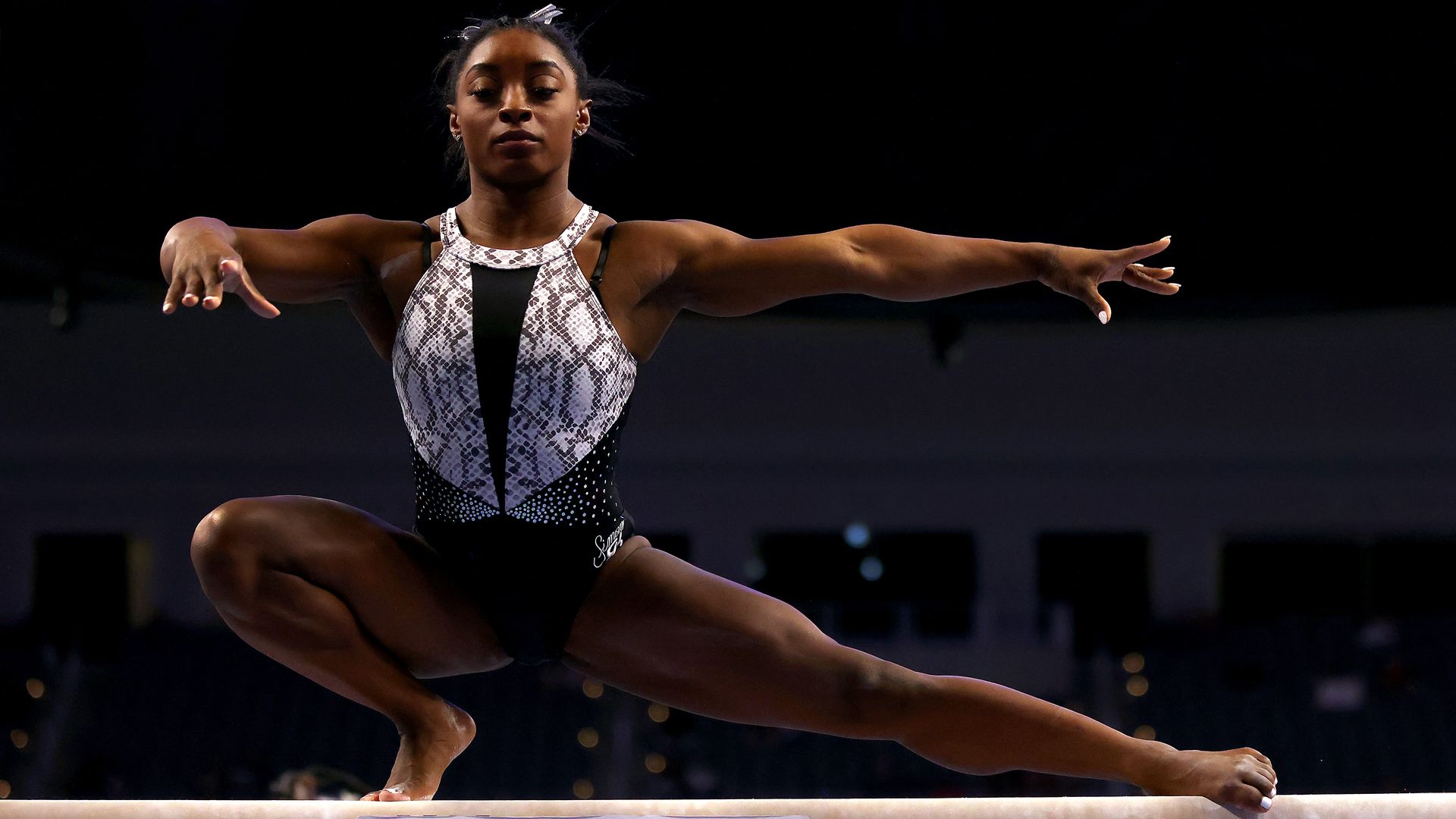 Simone Biles warms up on the beam prior to the Senior Women's competition of the U.S. Gymnastics Championships at Dickies Arena on June 06, 2021 in Fort Worth, Texas.