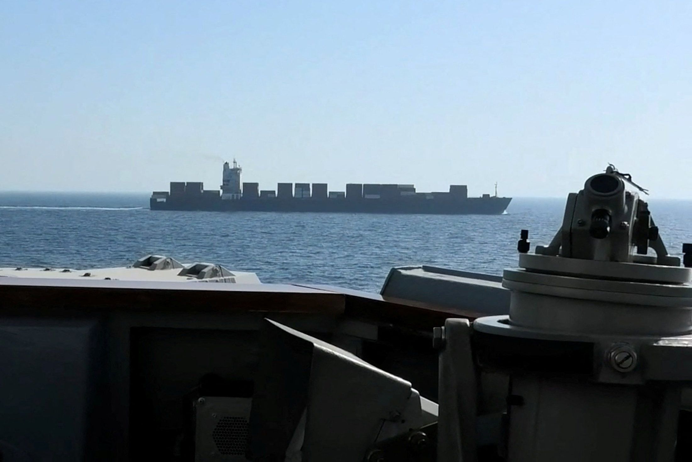 The USS Spruance intercepts the Iranian-flagged cargo ship M/V Touska yesterday in the north Arabian Sea. 