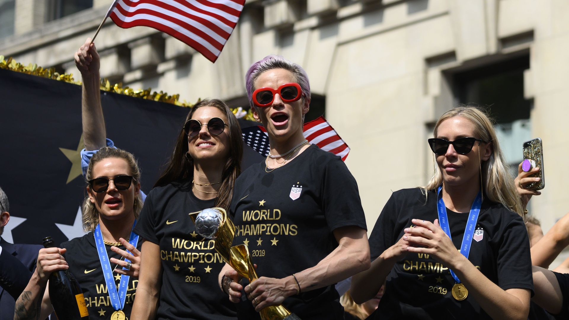 Megan Rapinoe (C) and other members of the World Cup-winning US women's team.