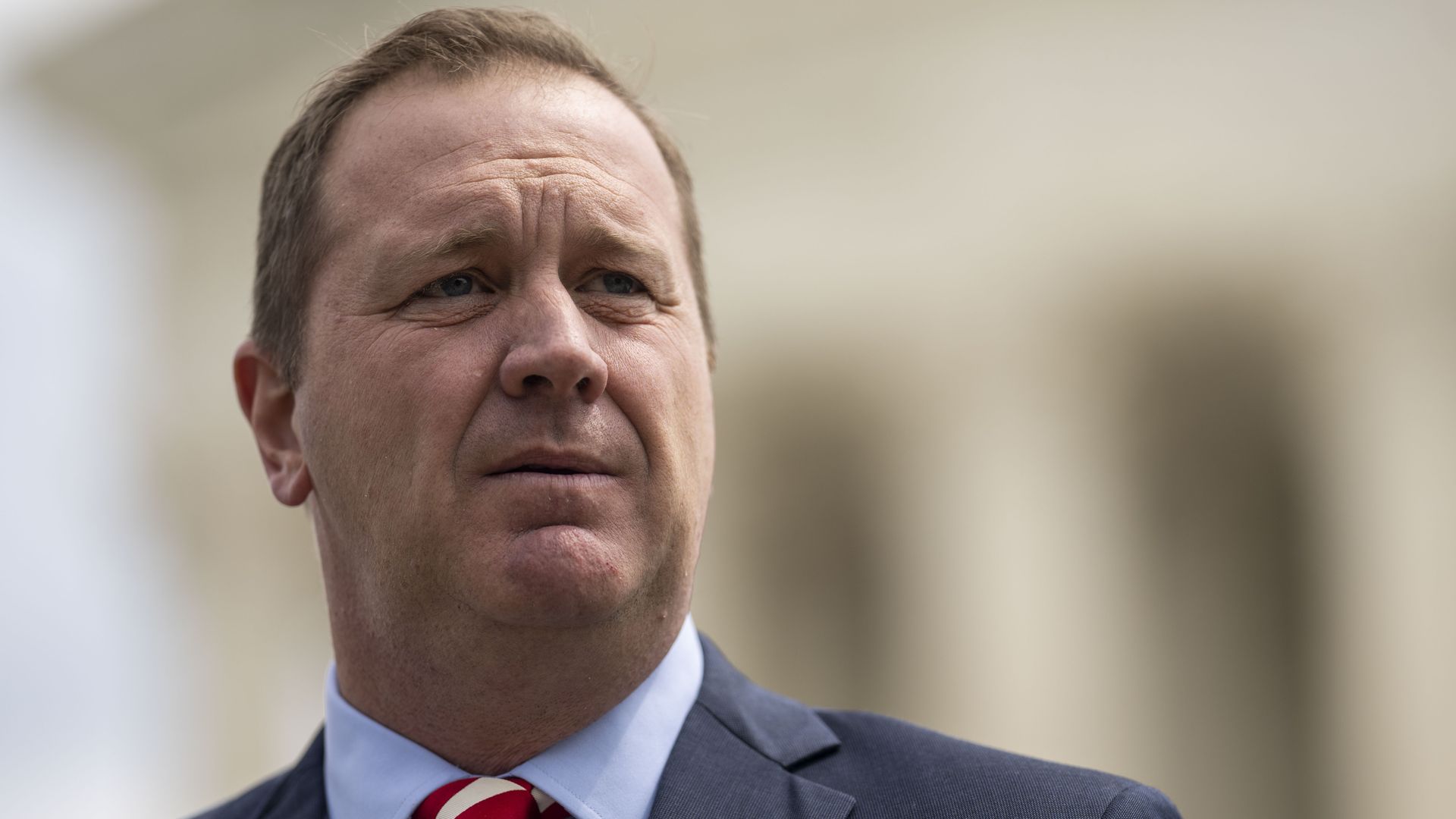 Missouri Attorney General Eric Schmitt speaks to reporters in front of the Supreme Court of the United States on Tuesday, April 26, 2022