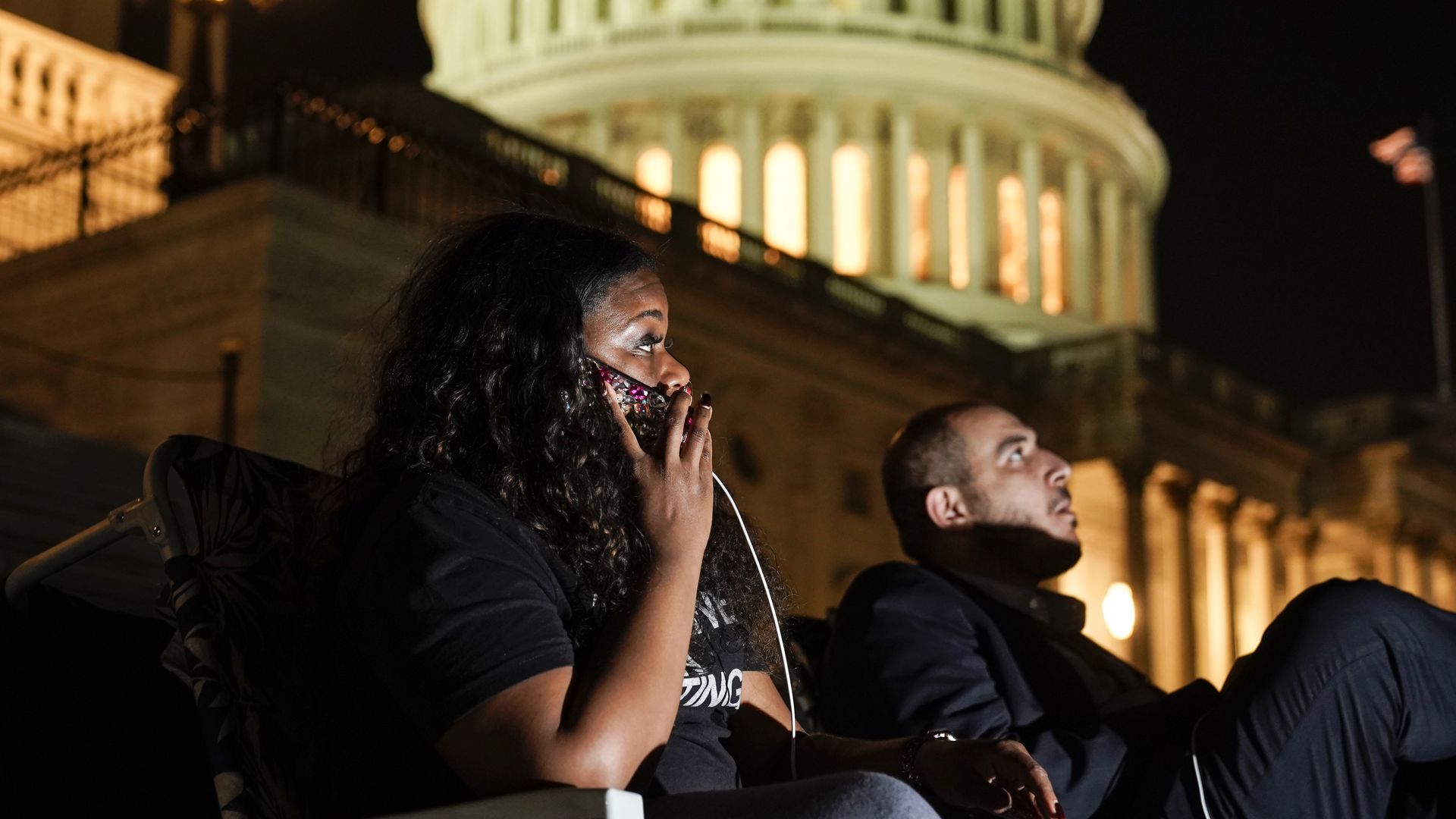  Rep. Cori Bush (D-MO) speaks with supporters as she spends the night outside the U.S. Capitol to call for for an extension of the federal eviction moratorium on July 31, 2021 