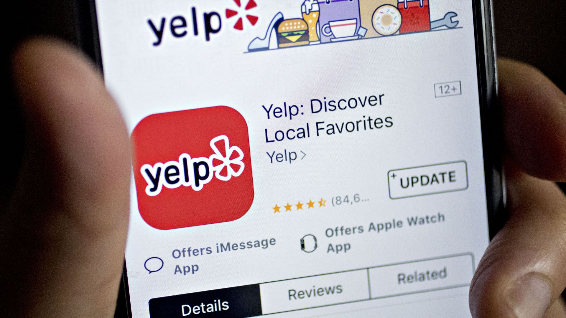 The Yelp Inc. application is seen in the App Store on an Apple Inc. iPhone in this arranged photograph taken in Washington, D.C., U.S., on Saturday, Oct. 28, 2017.