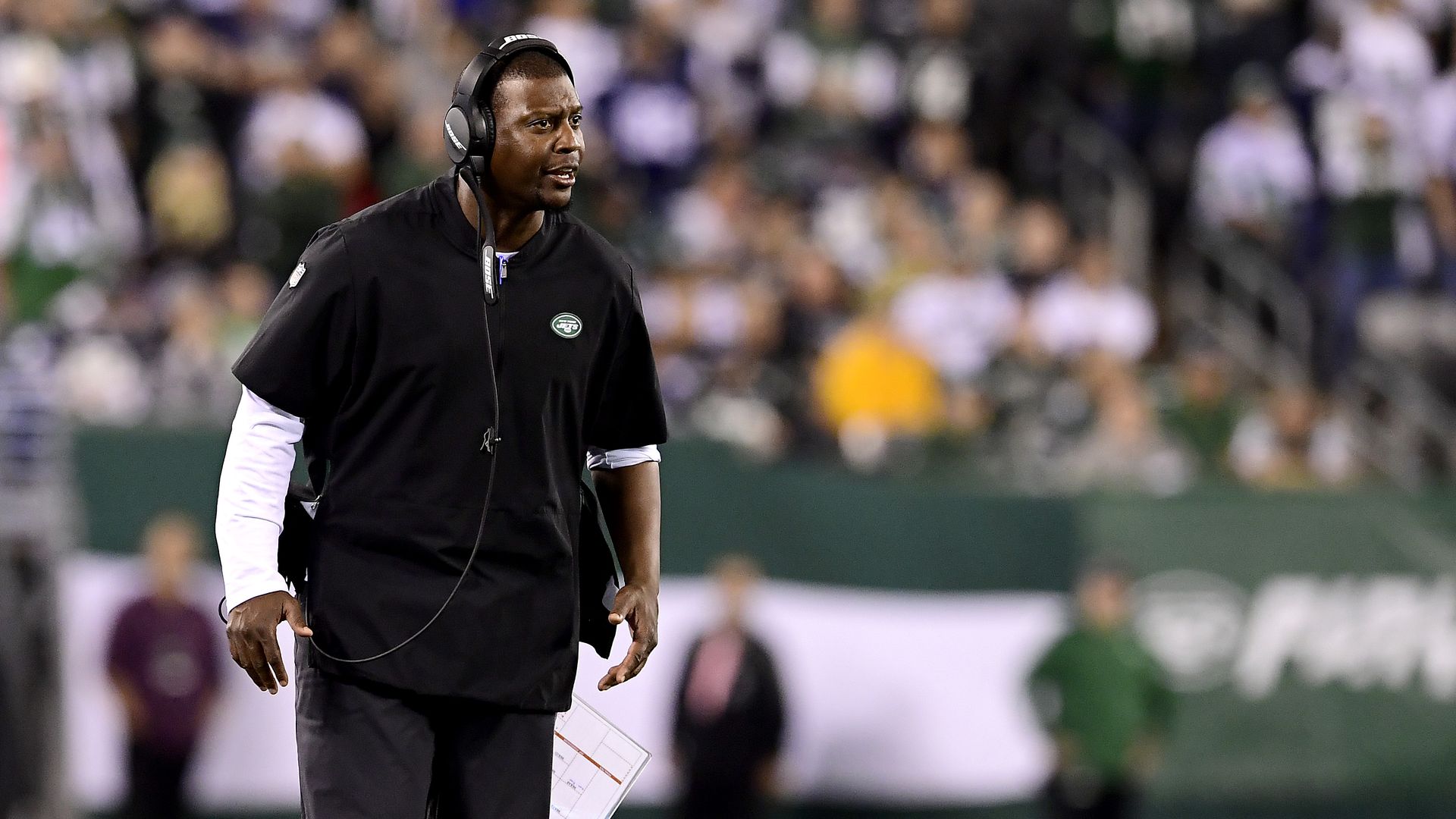 Assistant coach Dennard Wilson of the New York Jets reacts against the Dallas Cowboys at MetLife Stadium.