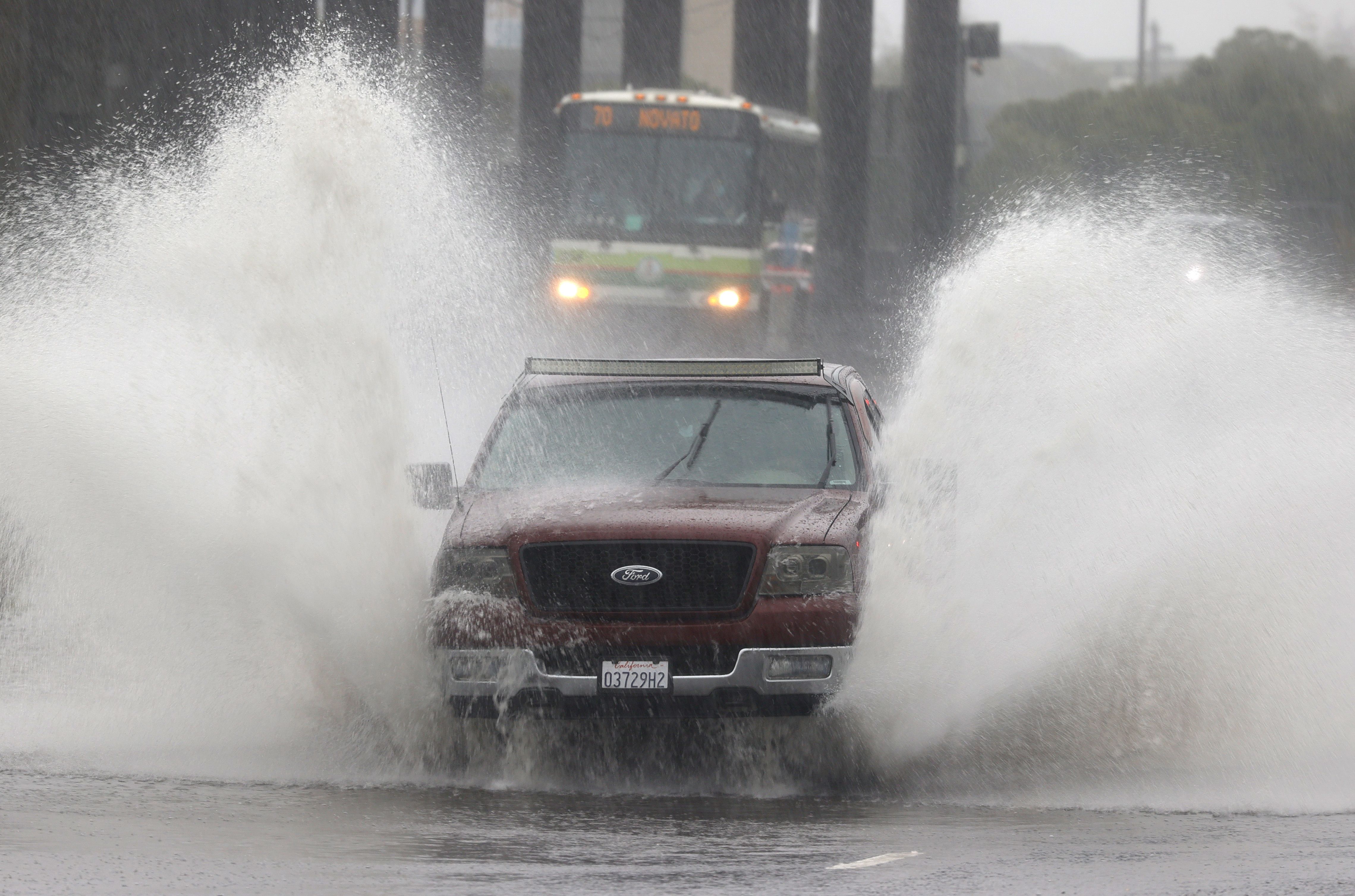  A truck driving through a flooded street in Mill Valley, California, on Oct. 24. 