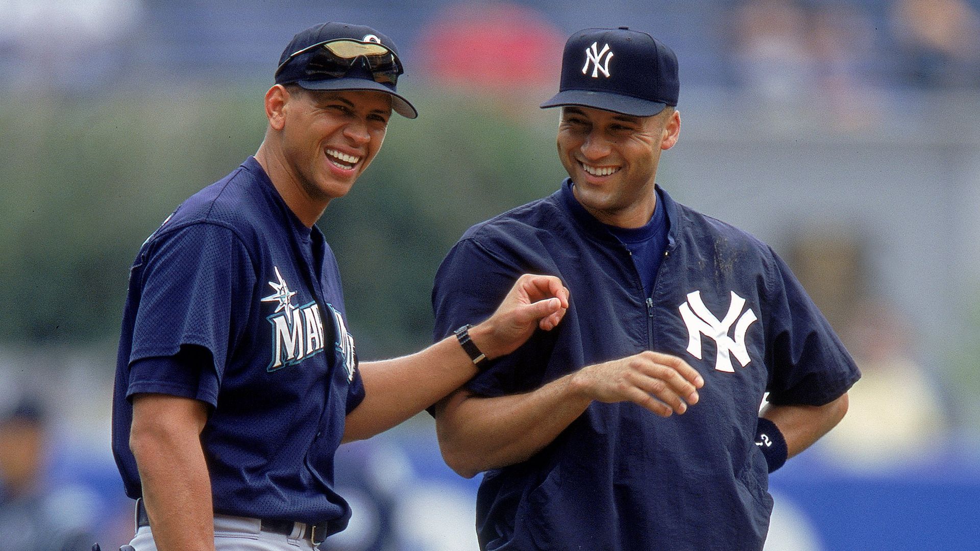 Alex Rodriguez and Derek Jeter share a laugh
