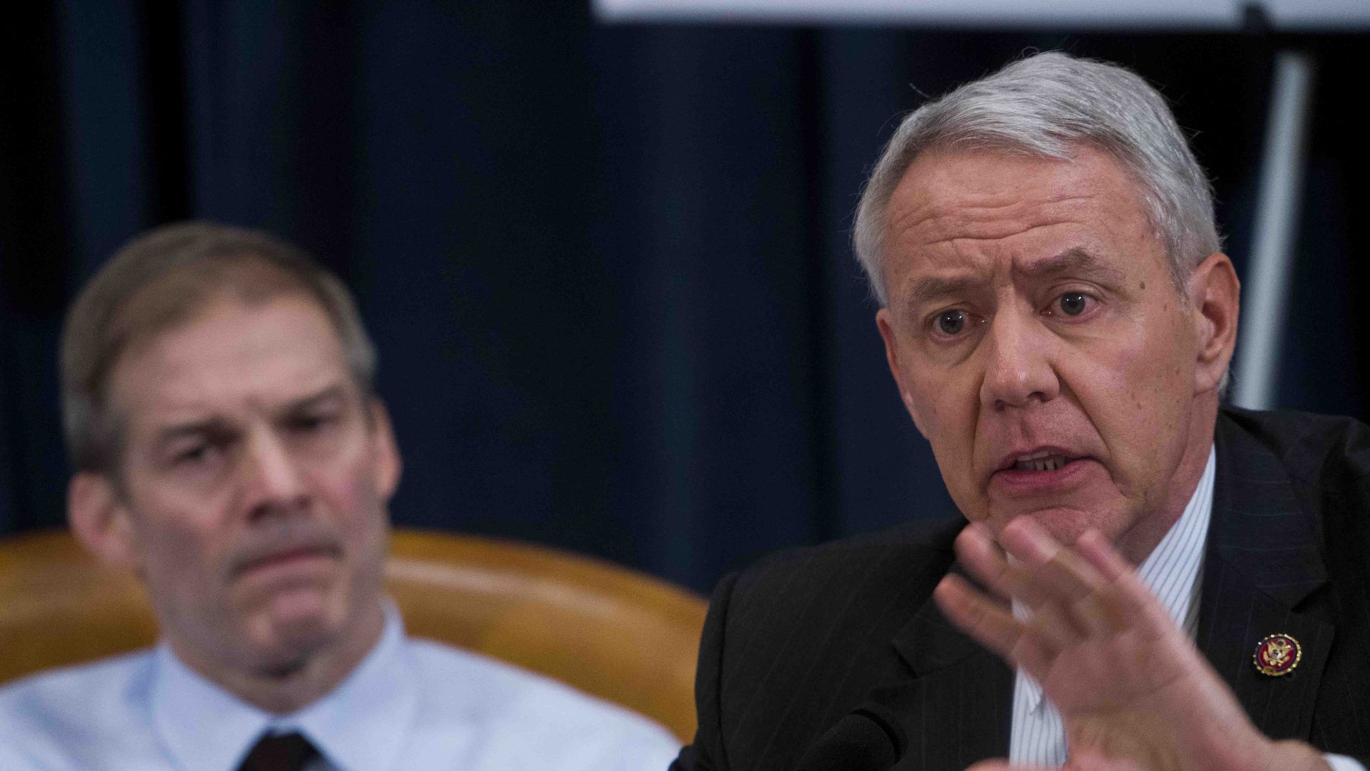 A photo of Rep. Ken Buck as he speaks at a hearing.