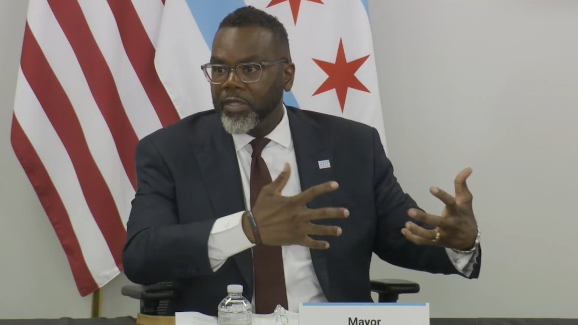 man in front of flags