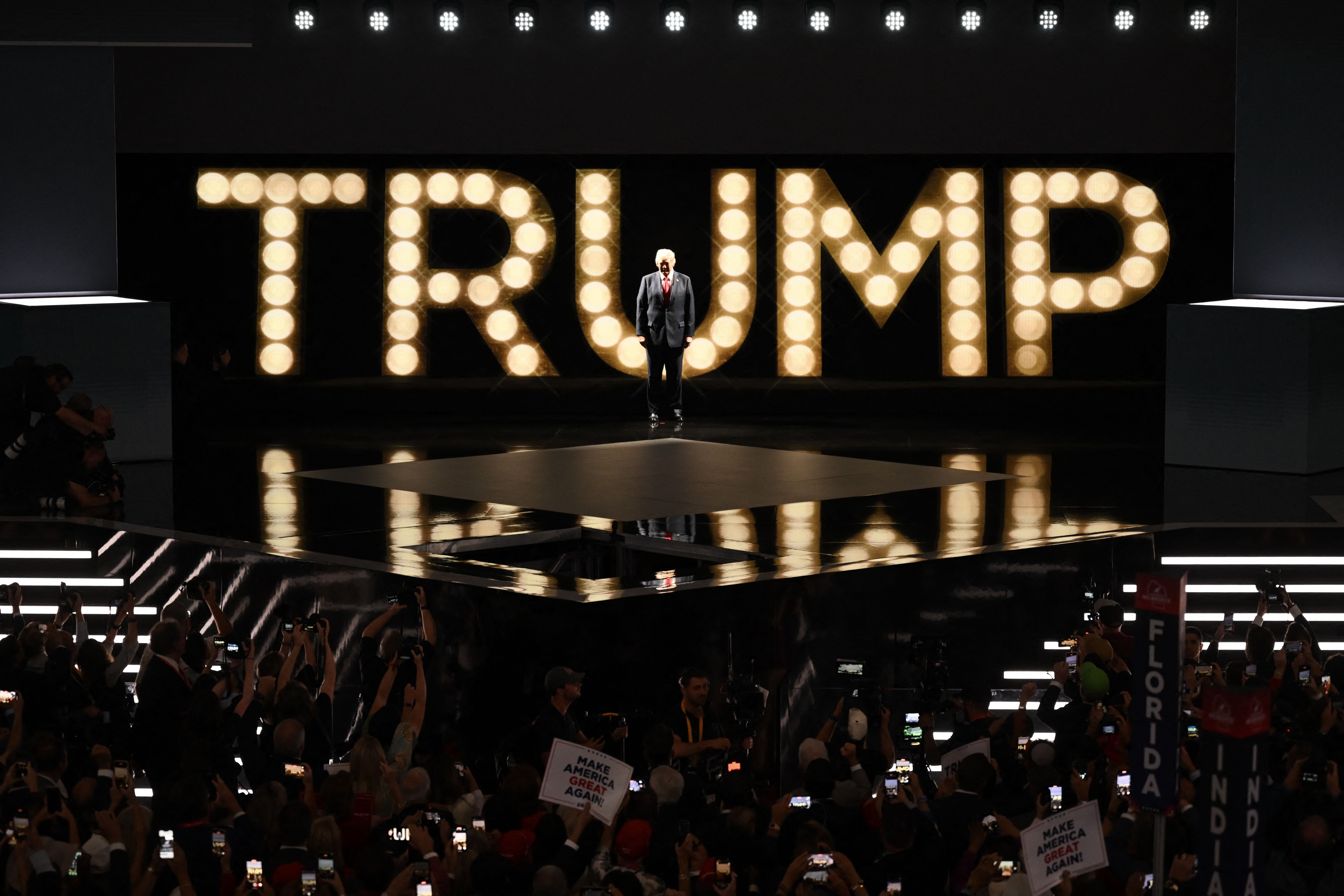 Former President Trump arrives onstage to deliver his acceptance speech during the Republican convention in Milwaukee last night.